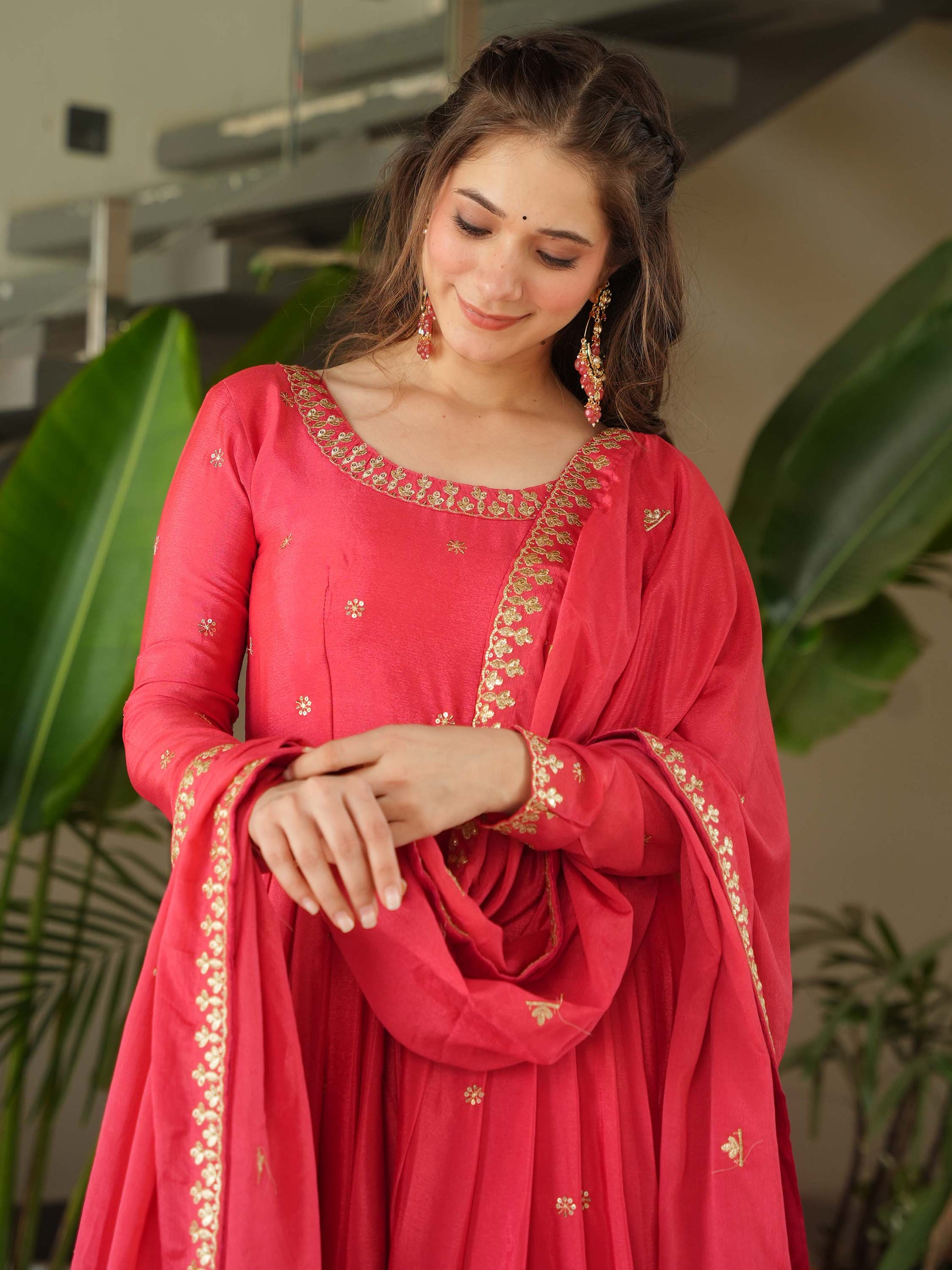 Fascinating Peach Zari Embroidered Chinon Festival Wear Gown