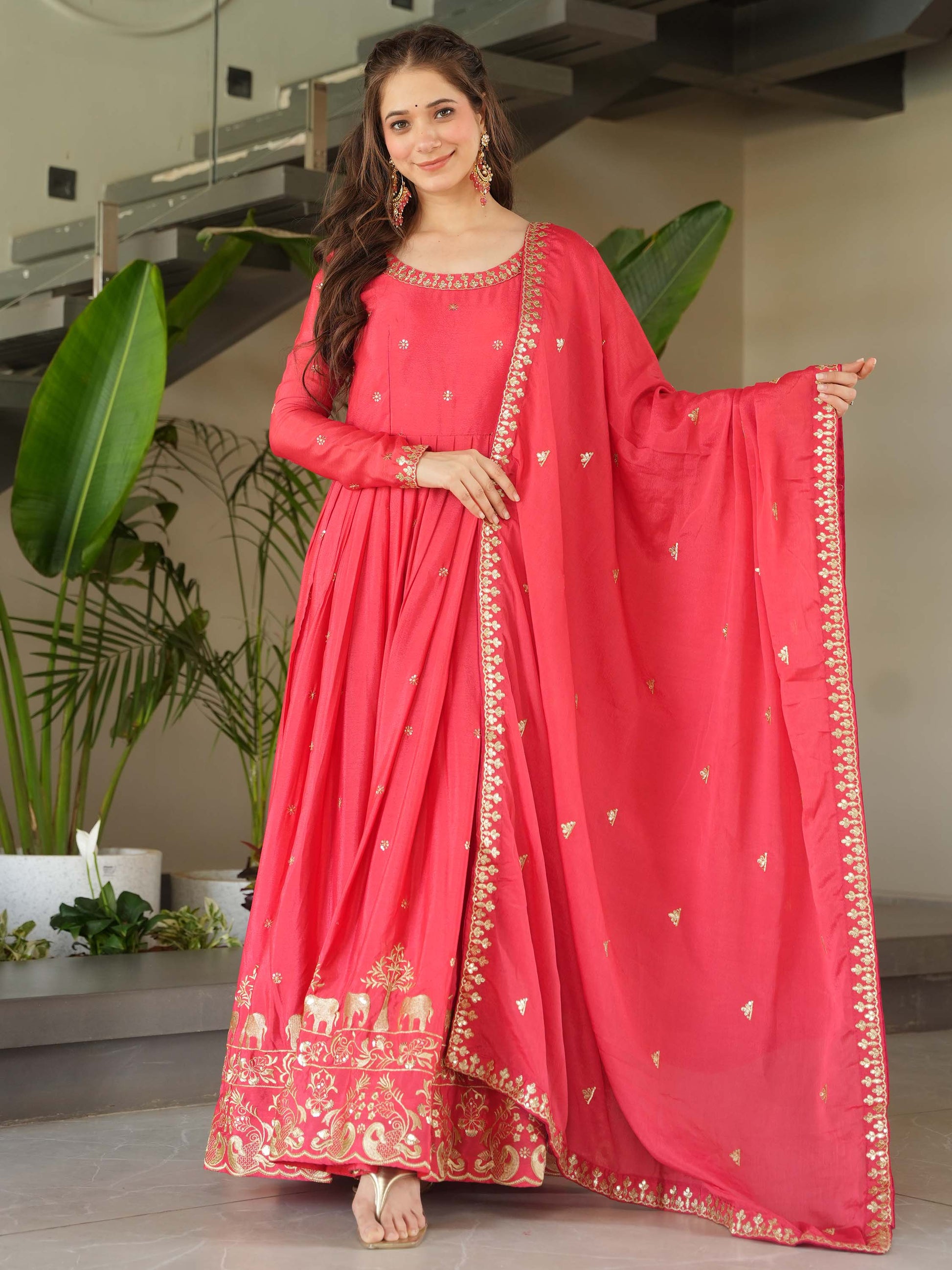 Fascinating Peach Zari Embroidered Chinon Festival Wear Gown