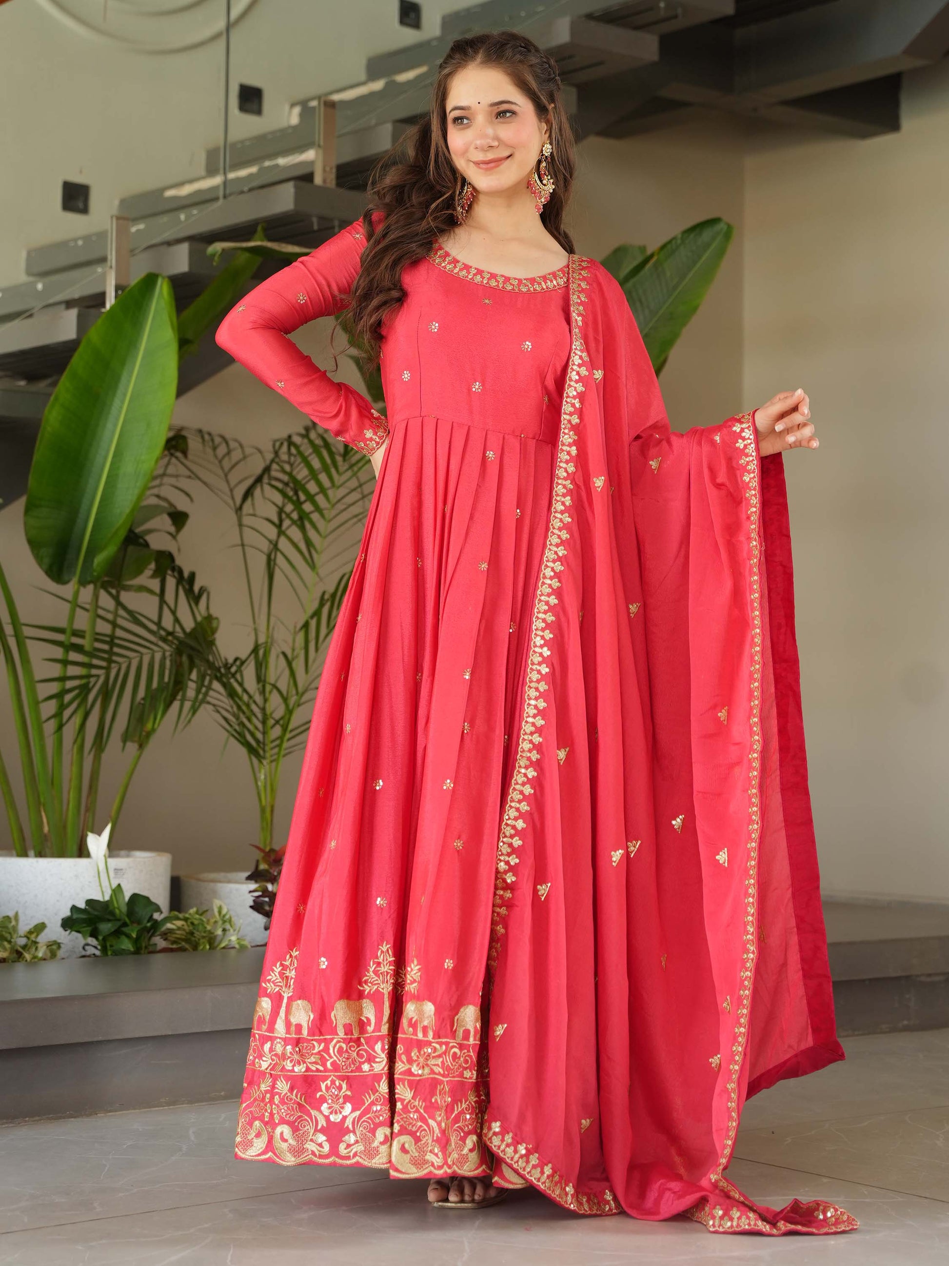 Fascinating Peach Zari Embroidered Chinon Festival Wear Gown