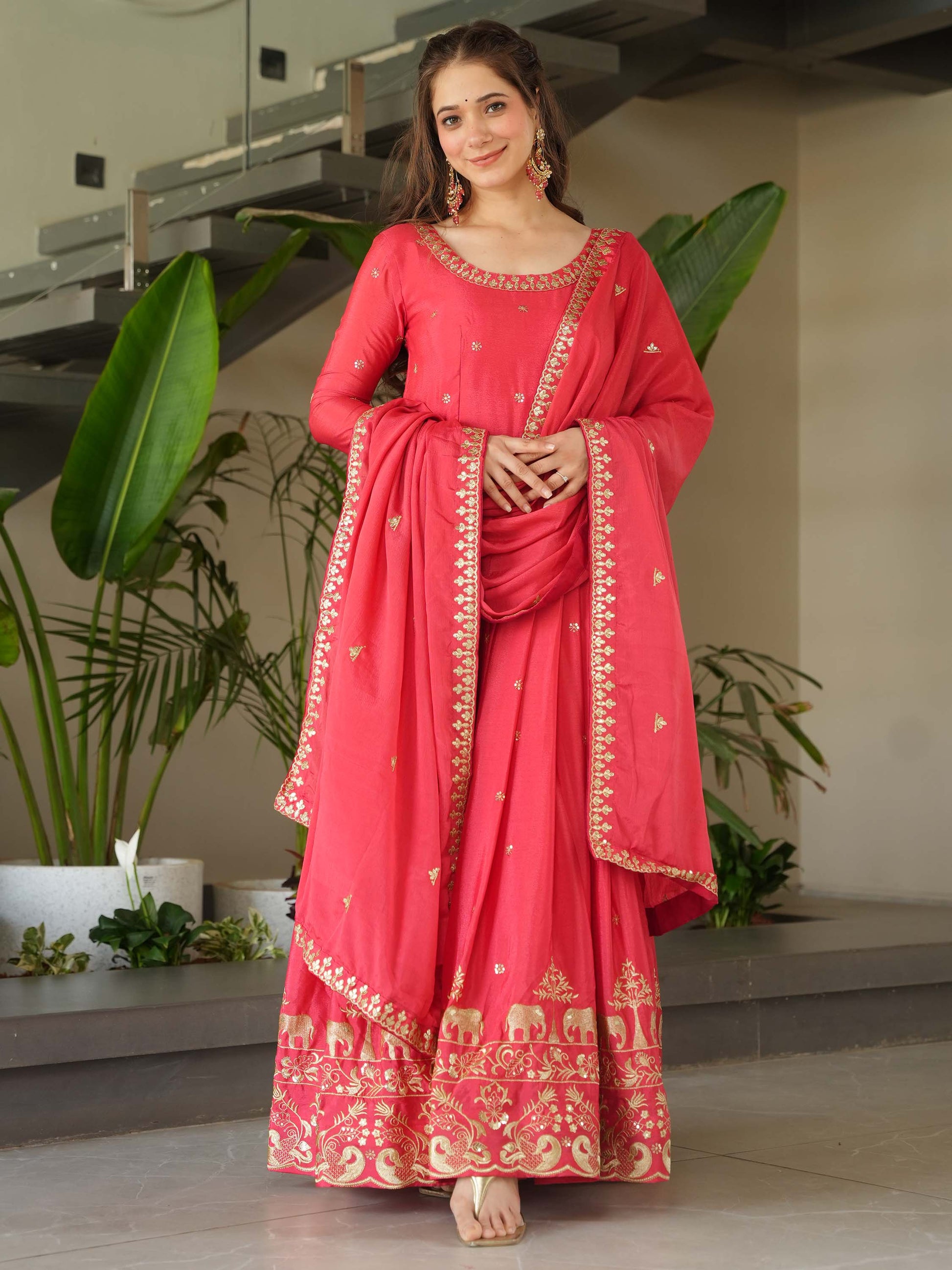 Fascinating Peach Zari Embroidered Chinon Festival Wear Gown