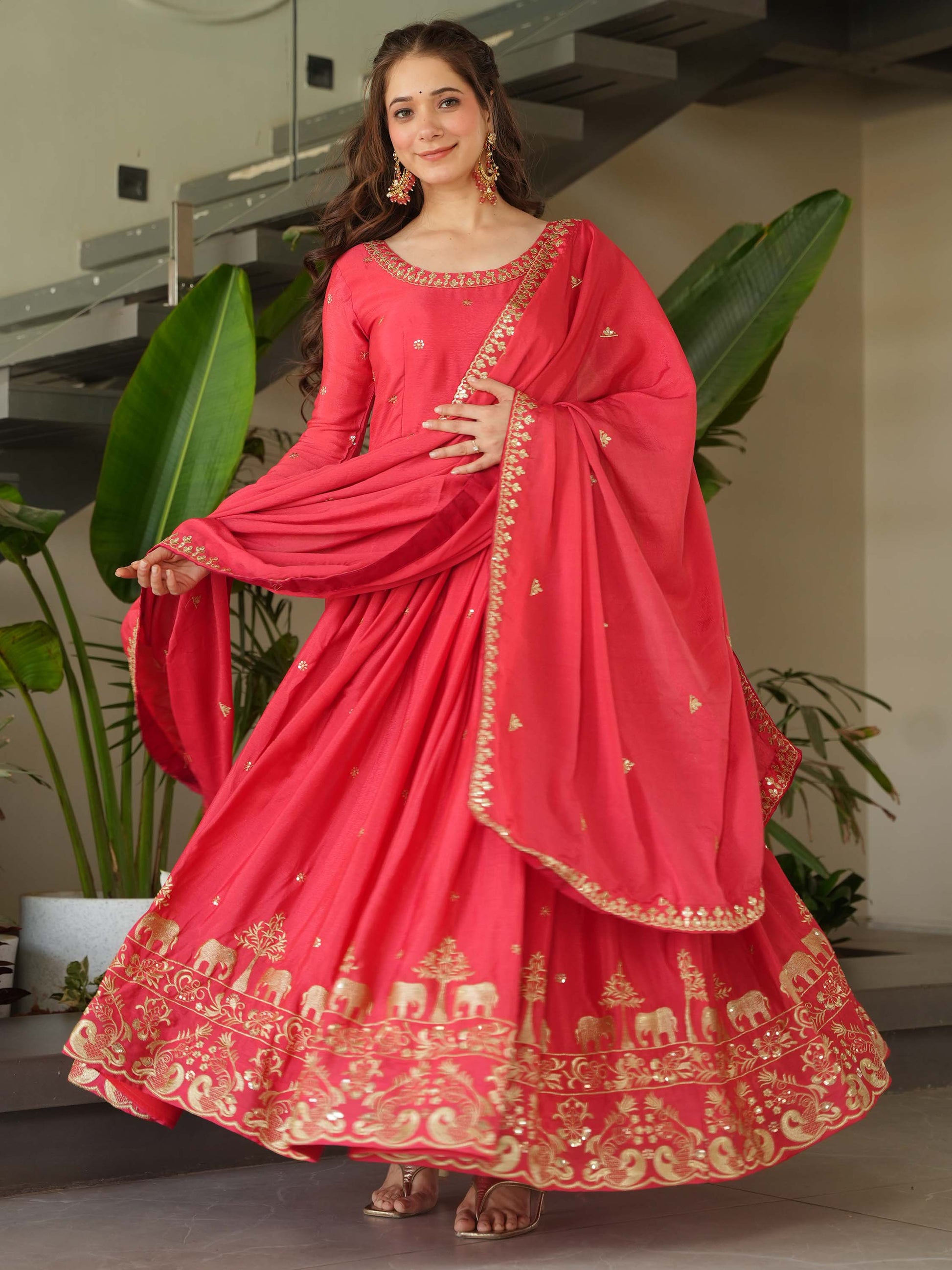 Fascinating Peach Zari Embroidered Chinon Festival Wear Gown
