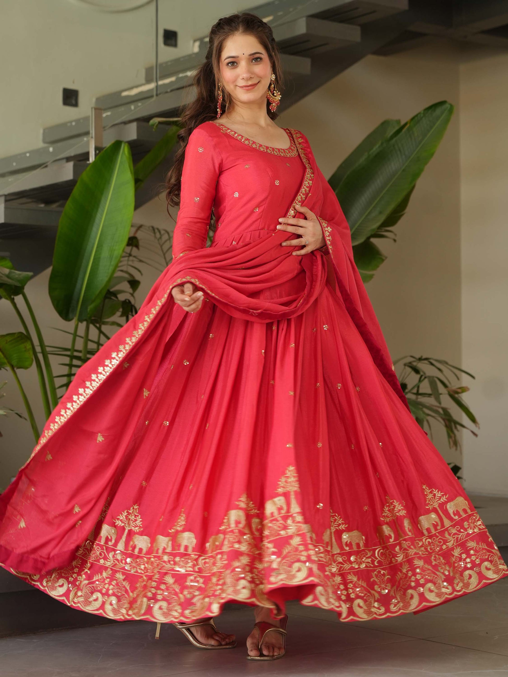 Fascinating Peach Zari Embroidered Chinon Festival Wear Gown