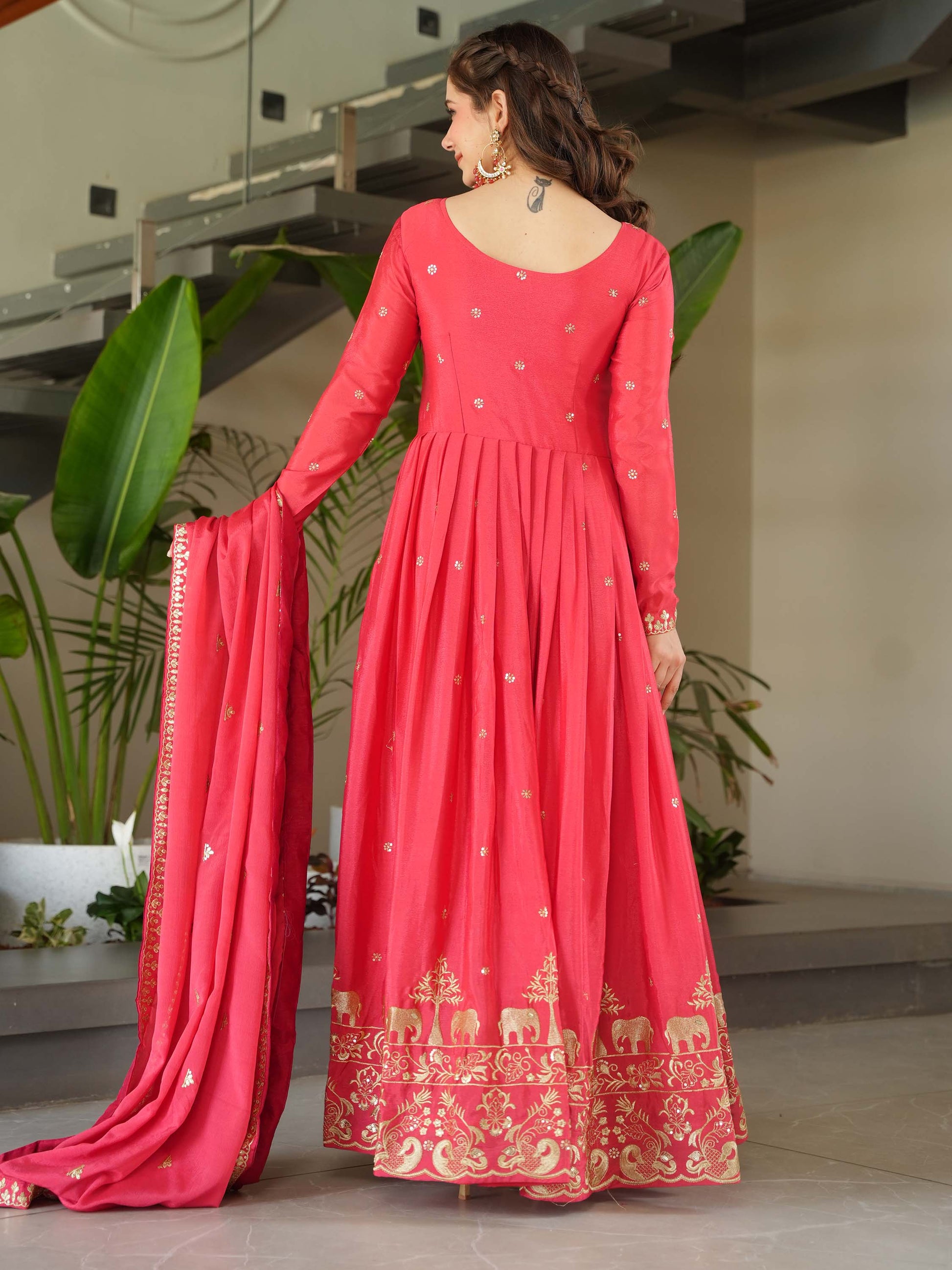 Fascinating Peach Zari Embroidered Chinon Festival Wear Gown