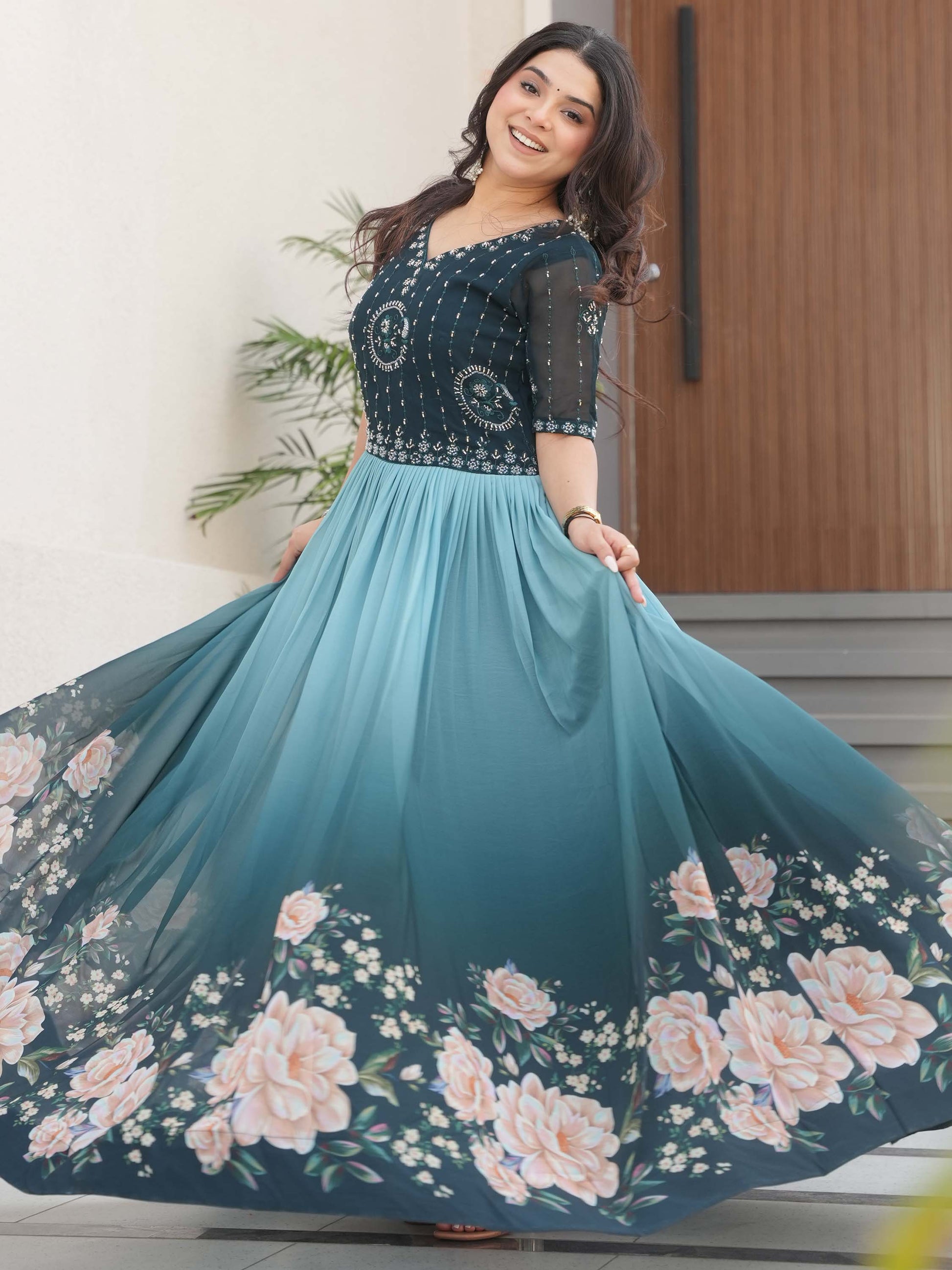 Marvelous Teal Blue Floral Printed Georgette Festival Wear Gown