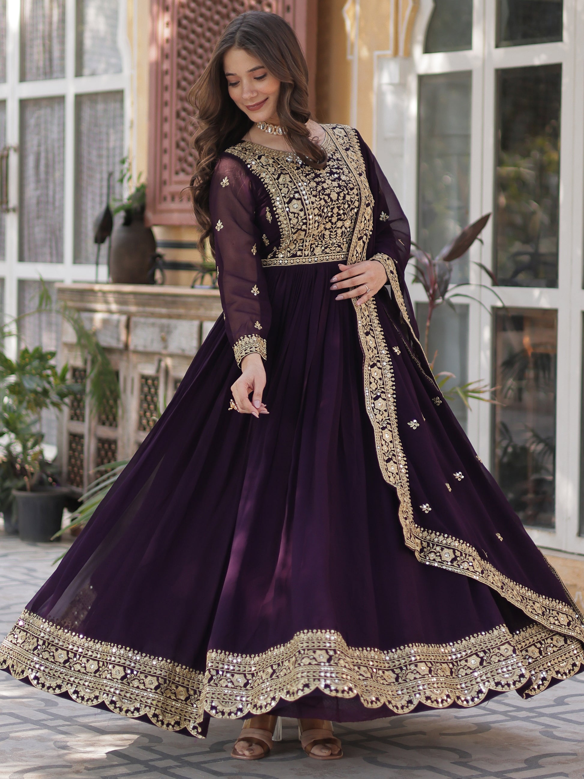 Glamorous Wine Zari Embroidered Georgette Reception Wear Gown