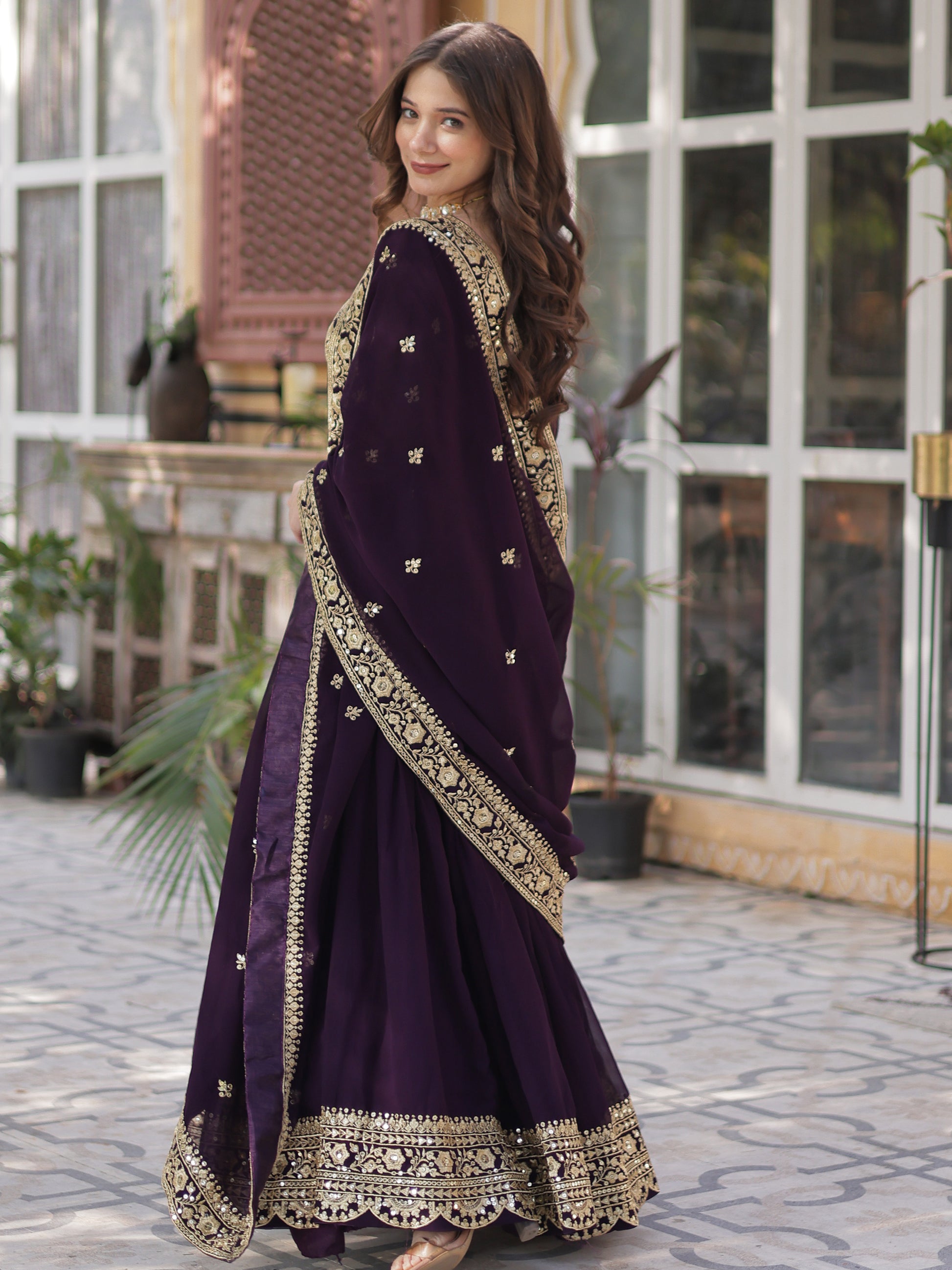 Glamorous Wine Zari Embroidered Georgette Reception Wear Gown