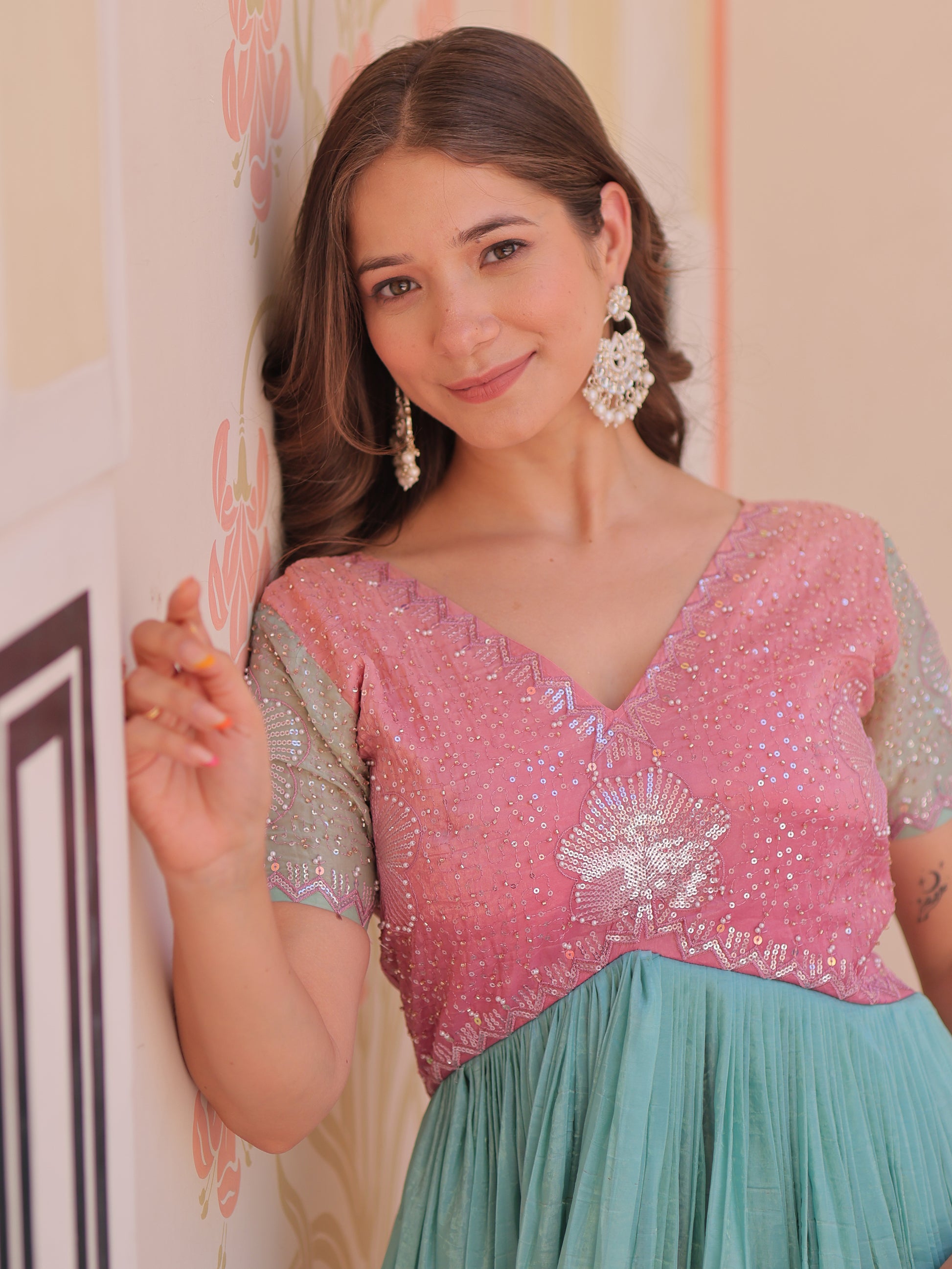 Astonishing Peach Pearl Work Organza Festival Wear Gown