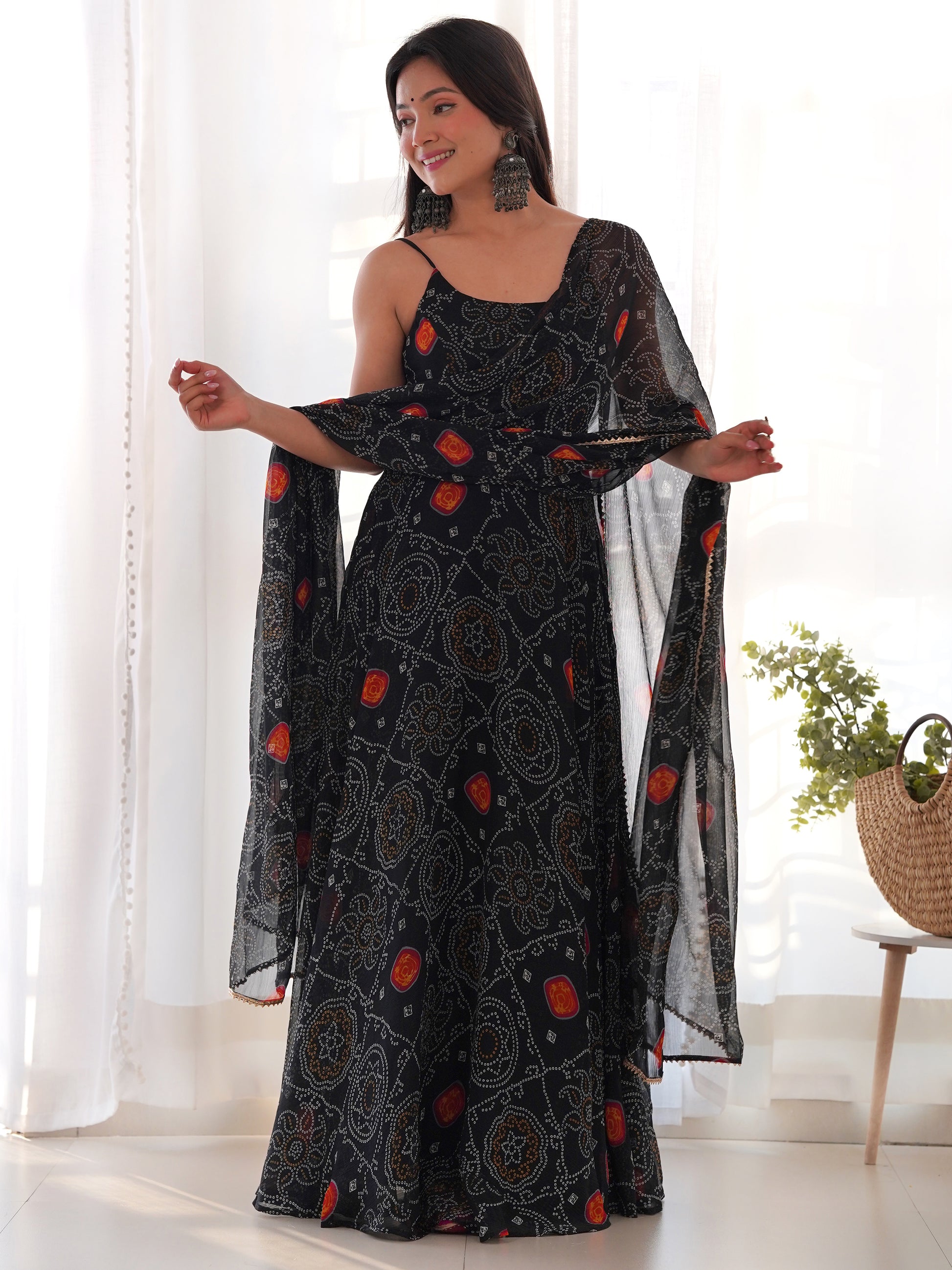 Captivating Black Bandhani Printed Chiffon Gown With Dupatta