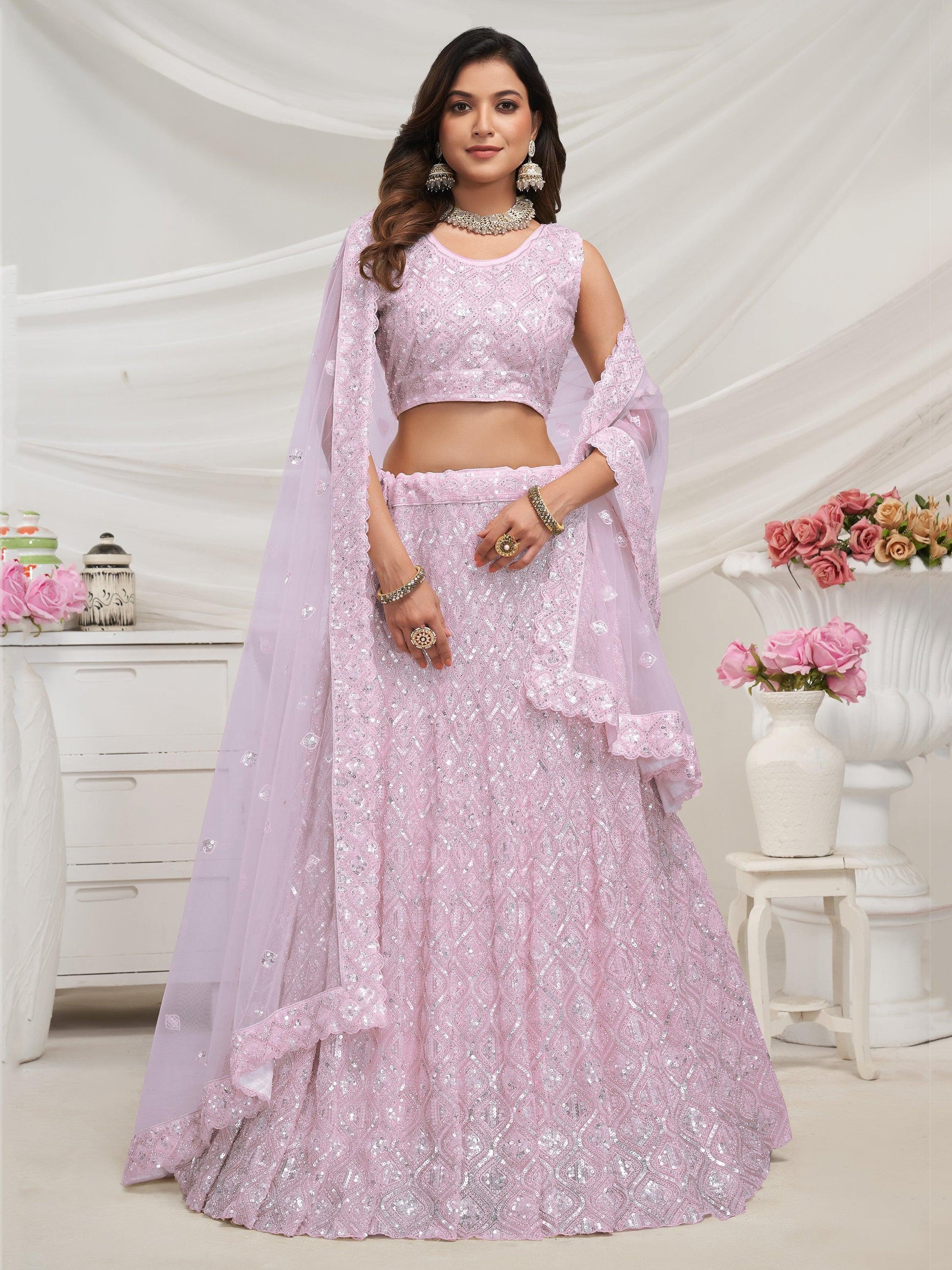 Enchanting Mauve Sequins Net Designer Lehenga Choli With Dupatta