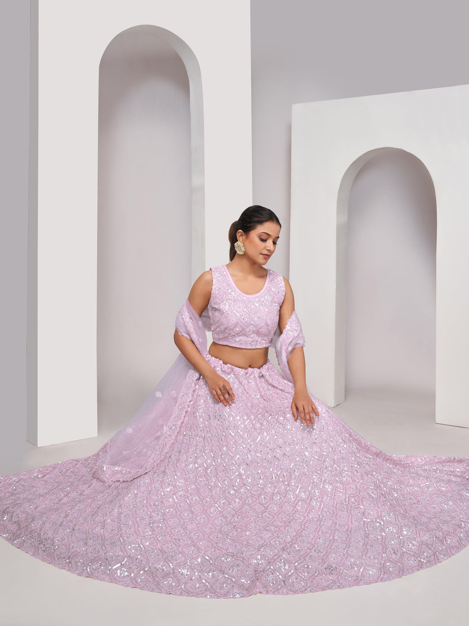 Enchanting Mauve Sequins Net Designer Lehenga Choli With Dupatta