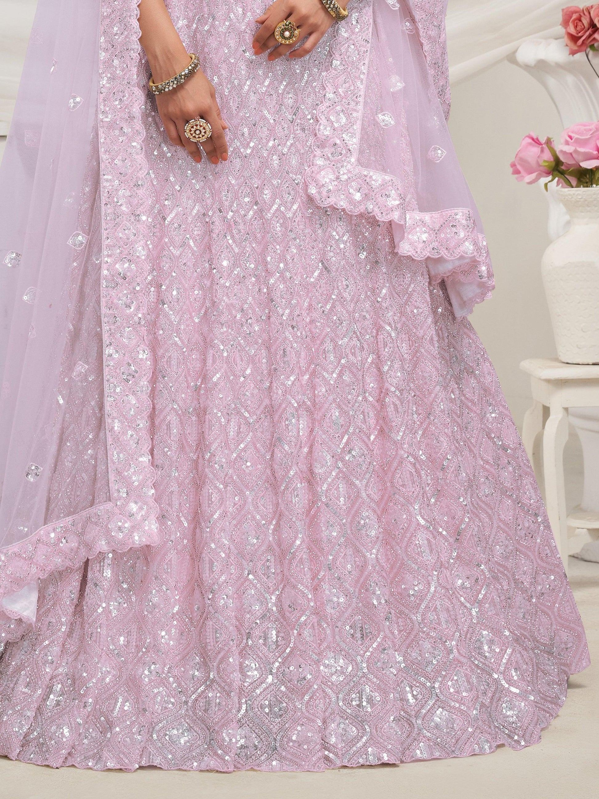 Enchanting Mauve Sequins Net Designer Lehenga Choli With Dupatta