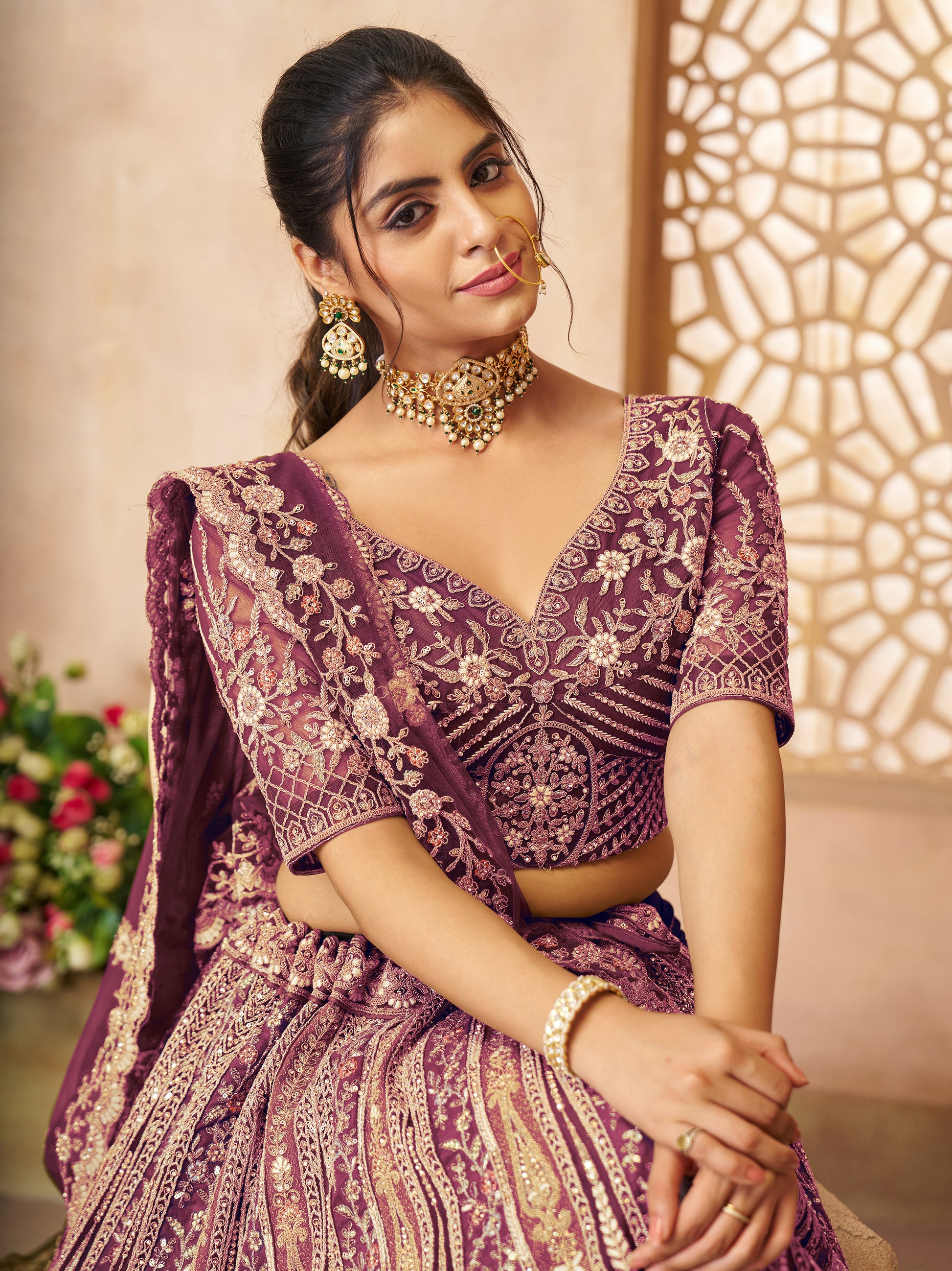 Enchanting Wine Thread Work Net Engagement Wear Lehenga Choli