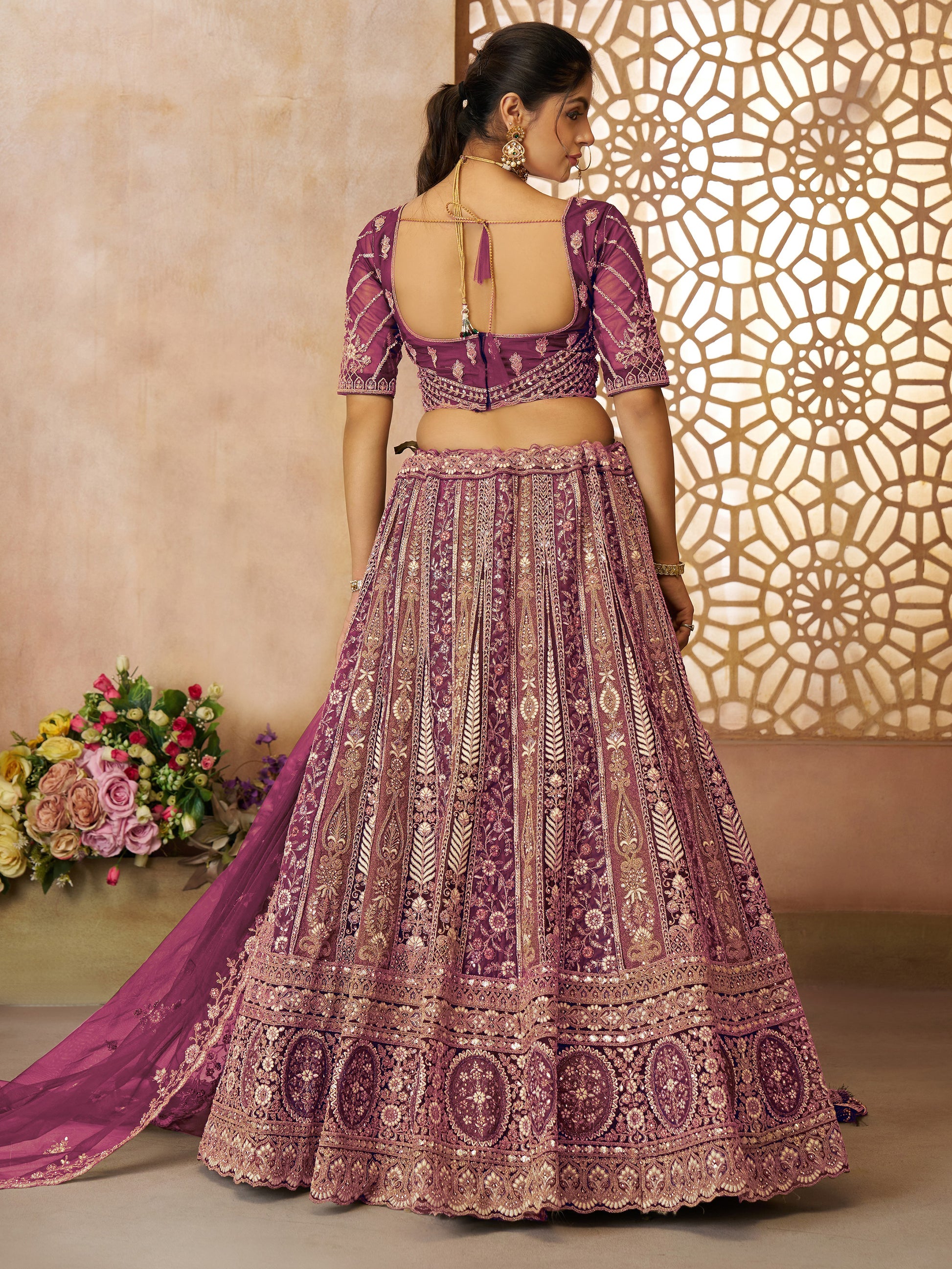 Enchanting Wine Thread Work Net Engagement Wear Lehenga Choli