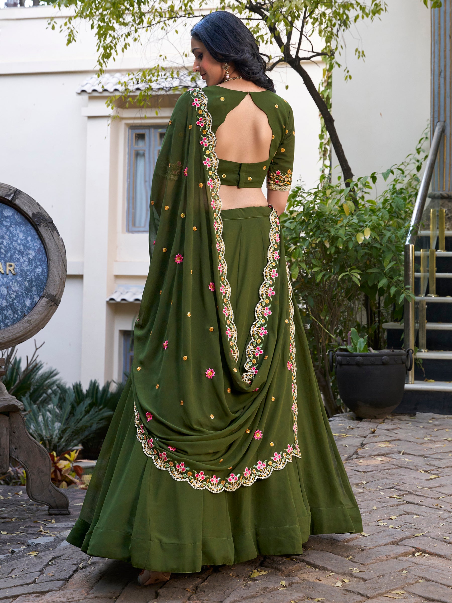 Beautiful Green Thread Work Georgette Mehendi Wear Lehenga Choli
