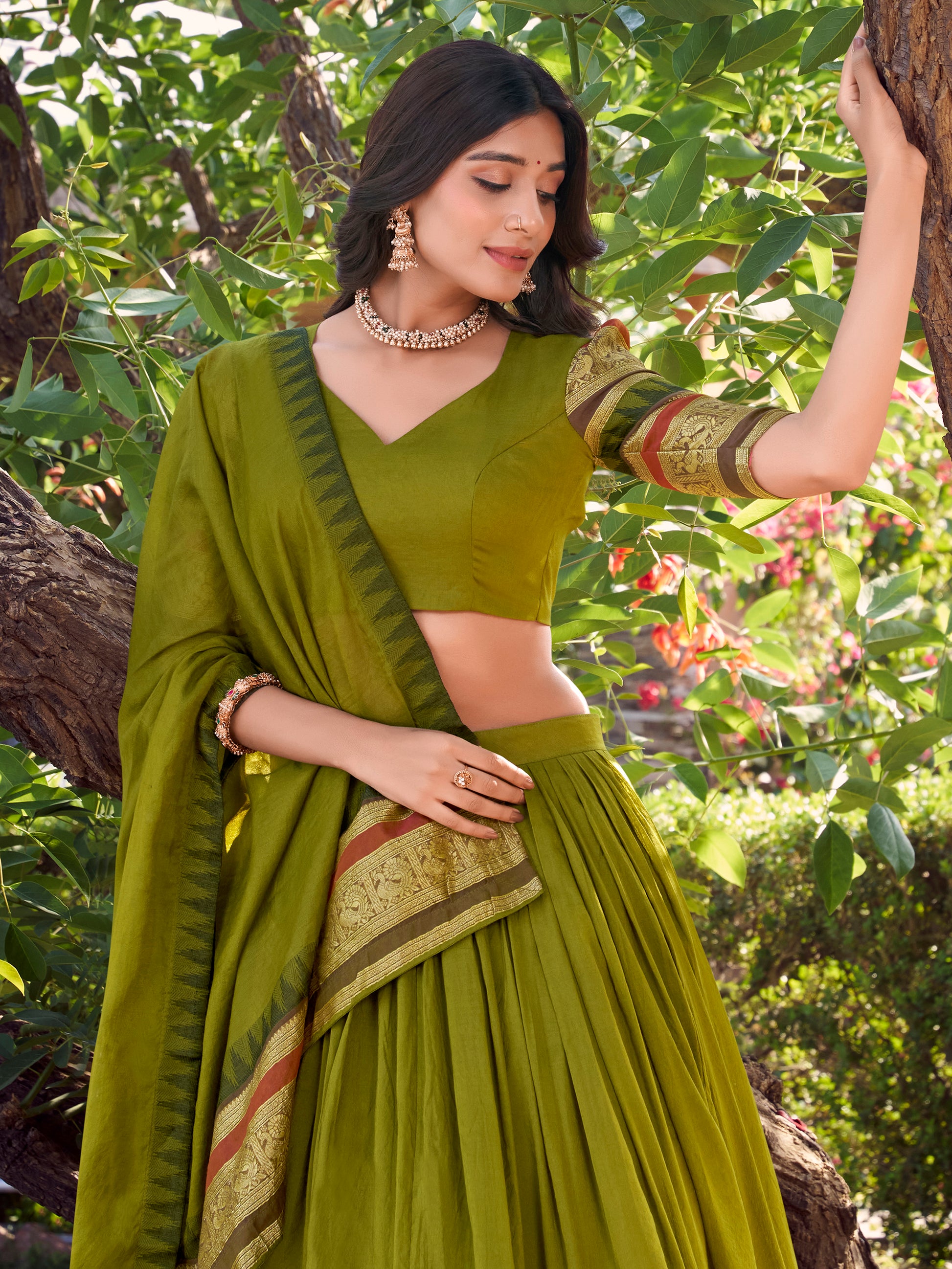 Glamorous Olive Green Zari Weaving Chanderi Half Saree Lehenga