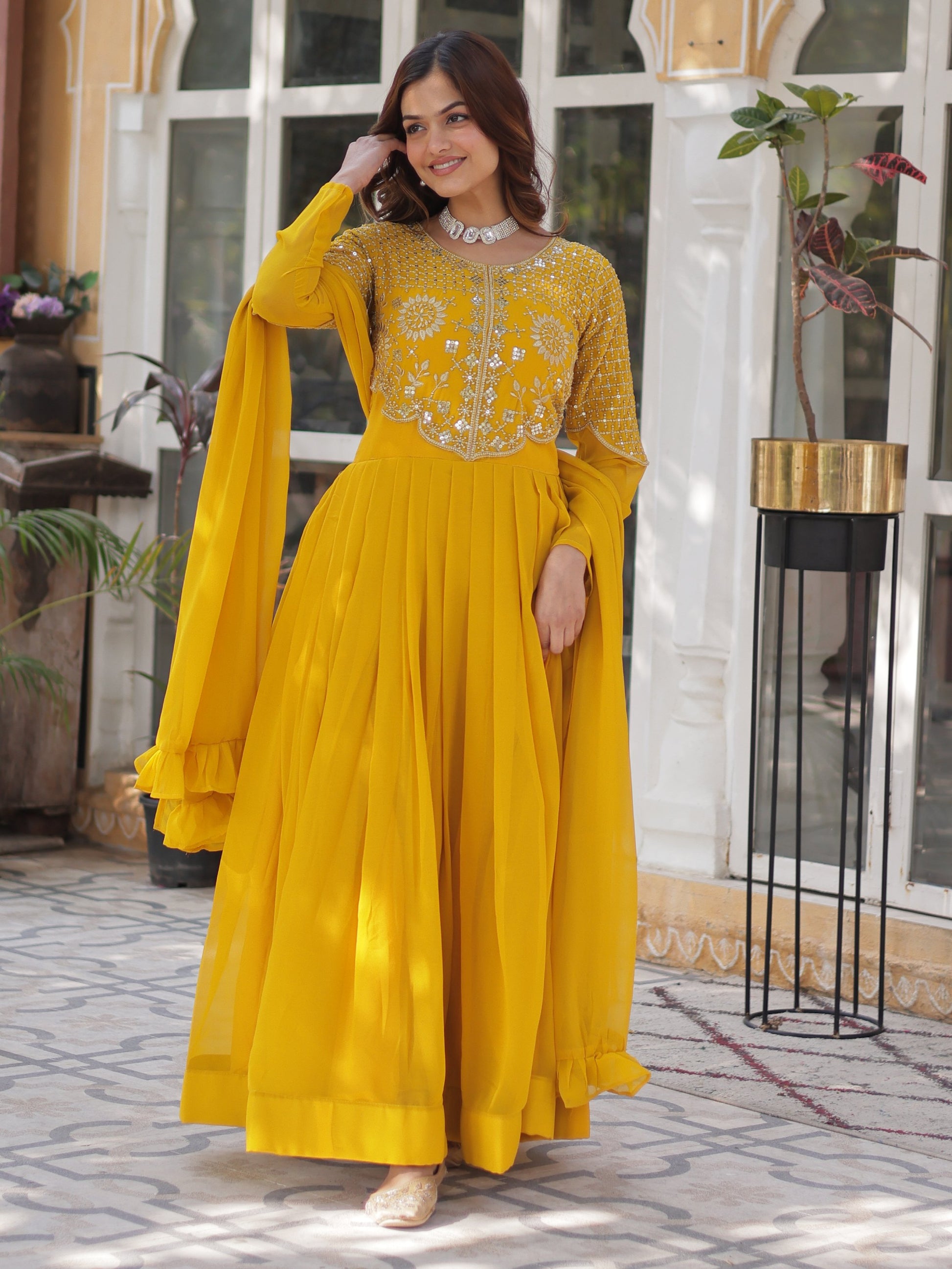 Alluring Mustard Yellow Zari Work Georgette Haldi Wear Gown With Dupatta