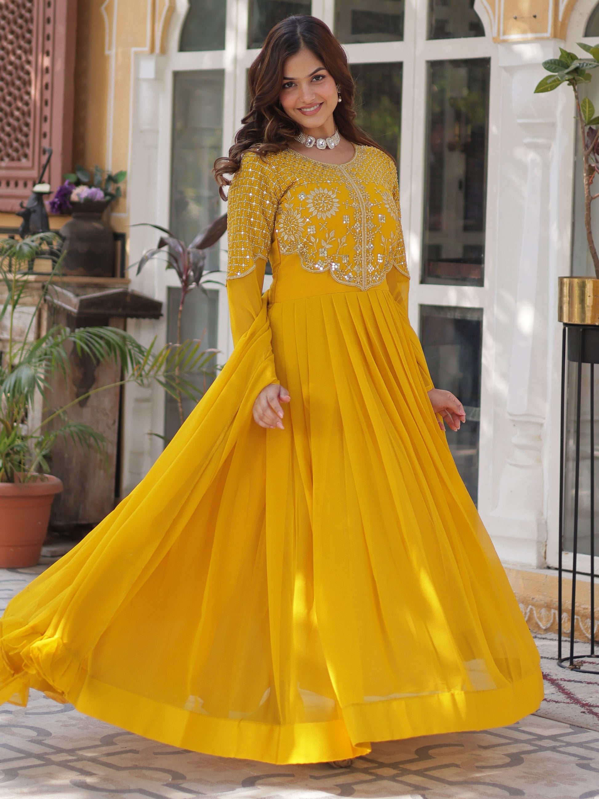 Alluring Mustard Yellow Zari Work Georgette Haldi Wear Gown With Dupatta