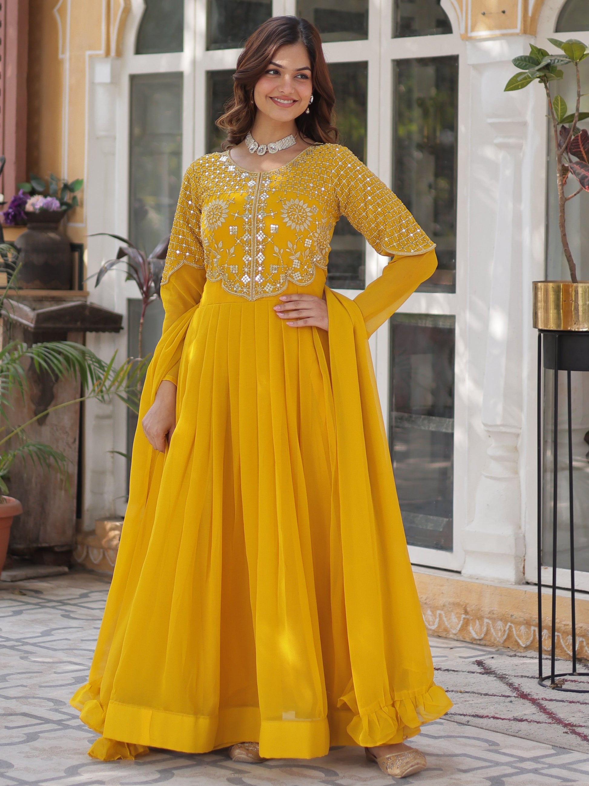 Alluring Mustard Yellow Zari Work Georgette Haldi Wear Gown With Dupatta