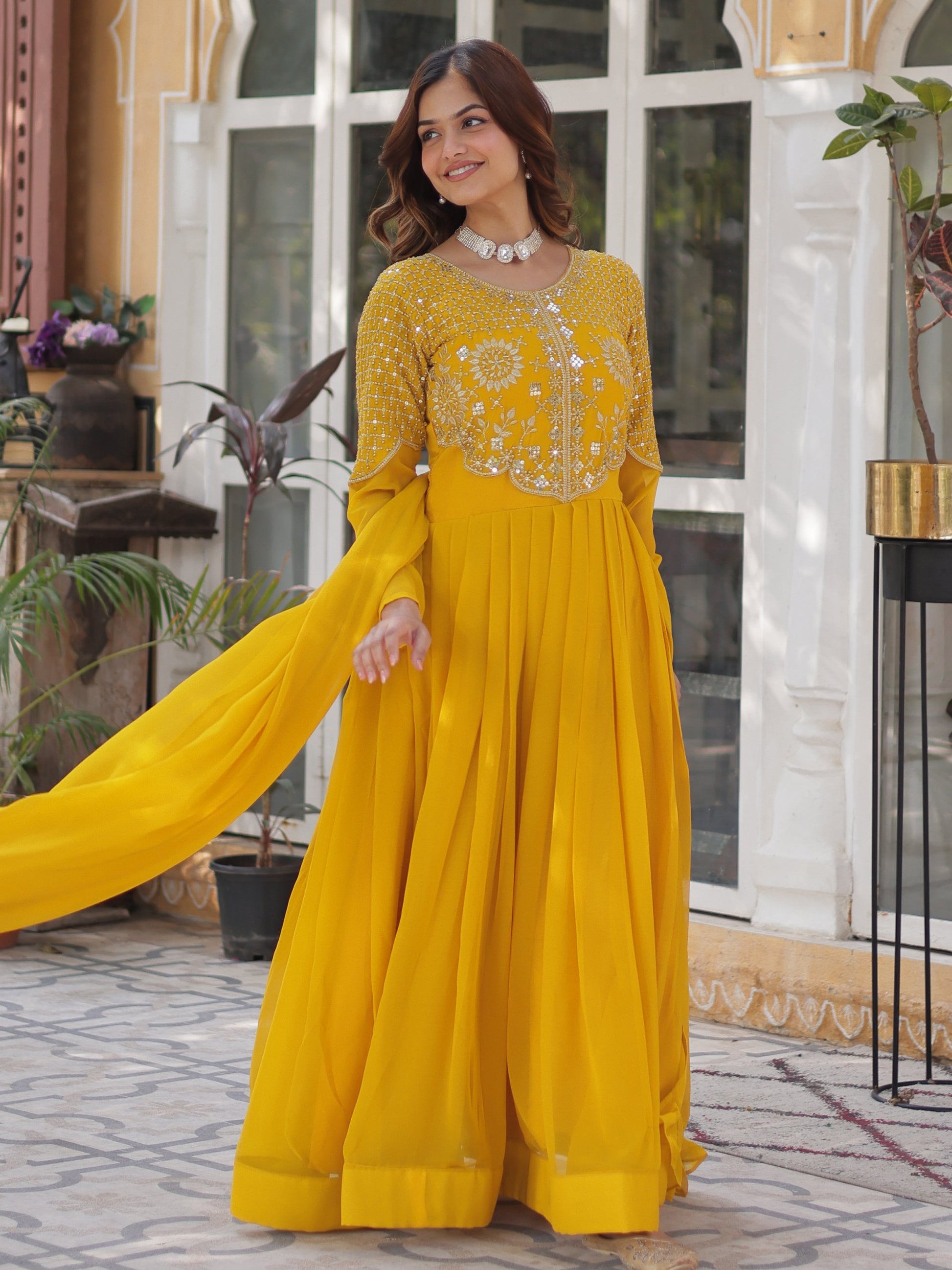 Alluring Mustard Yellow Zari Work Georgette Haldi Wear Gown With Dupatta