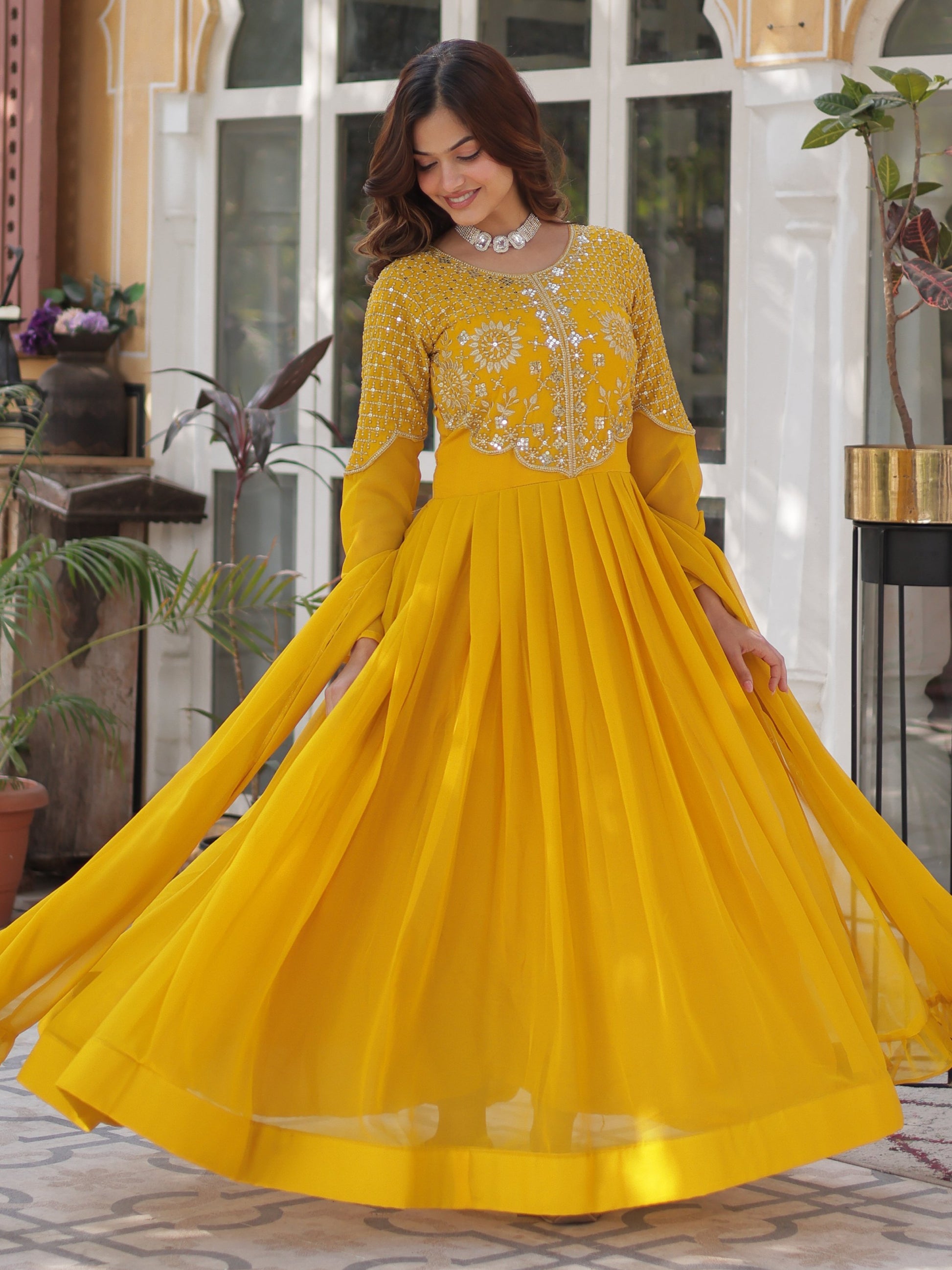 Alluring Mustard Yellow Zari Work Georgette Haldi Wear Gown With Dupatta