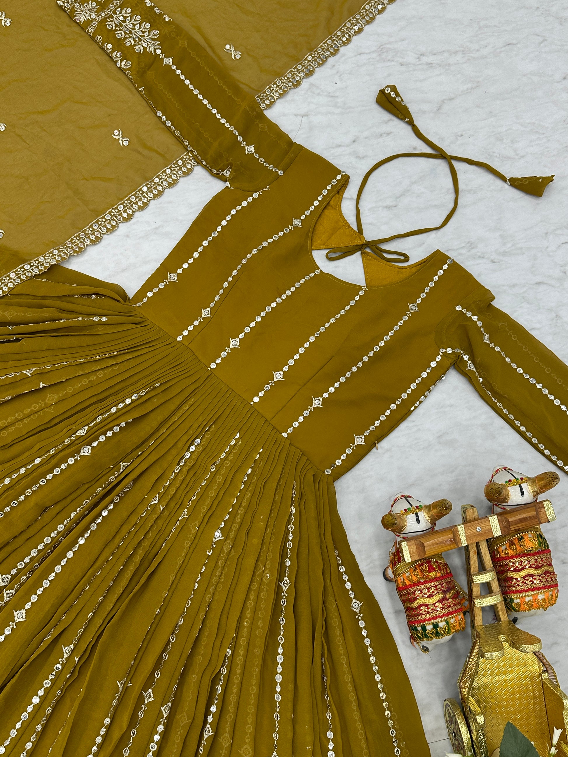 Gorgeous Olive Green Sequins Georgette Mehendi Wear Gown