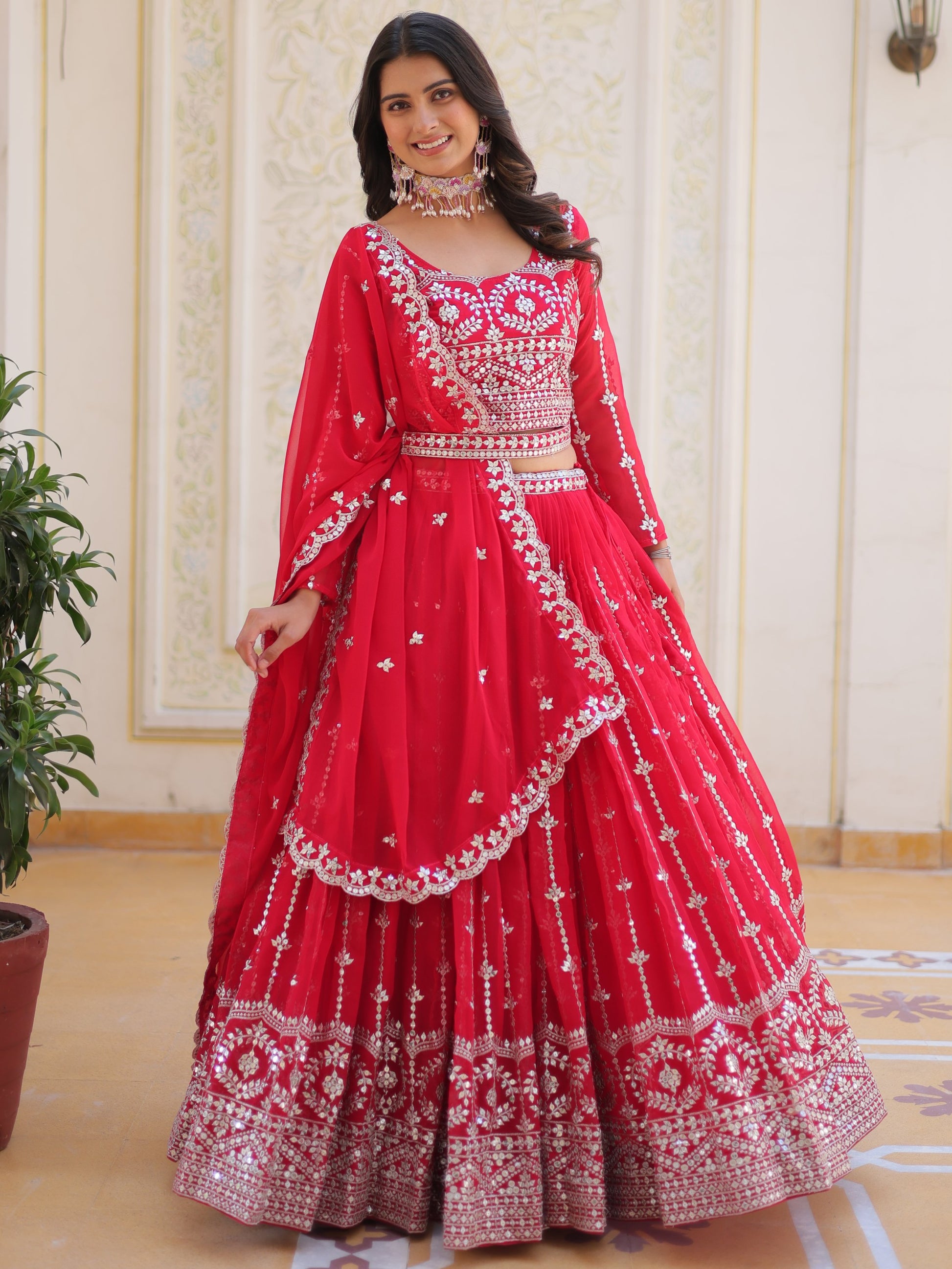 Fabulous Pink Sequins Georgette Party Wear Lehenga Choli With Dupatta