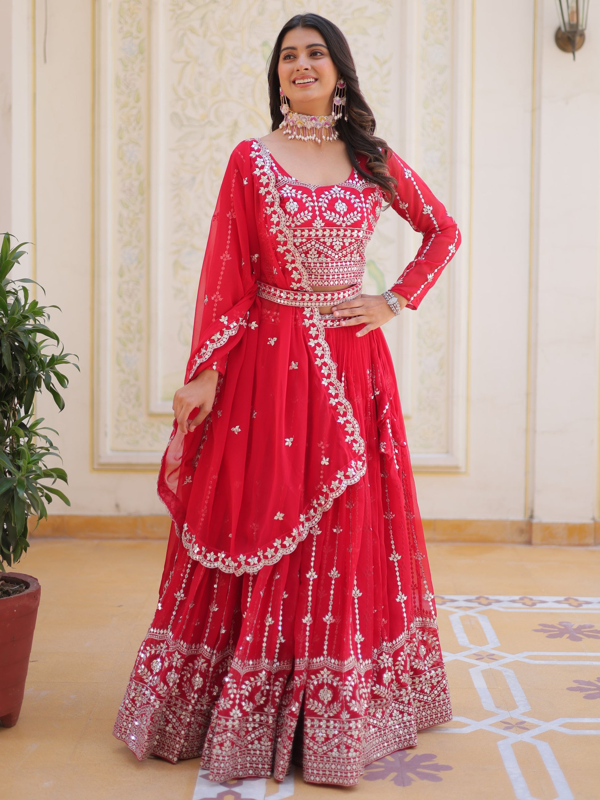 Fabulous Pink Sequins Georgette Party Wear Lehenga Choli With Dupatta