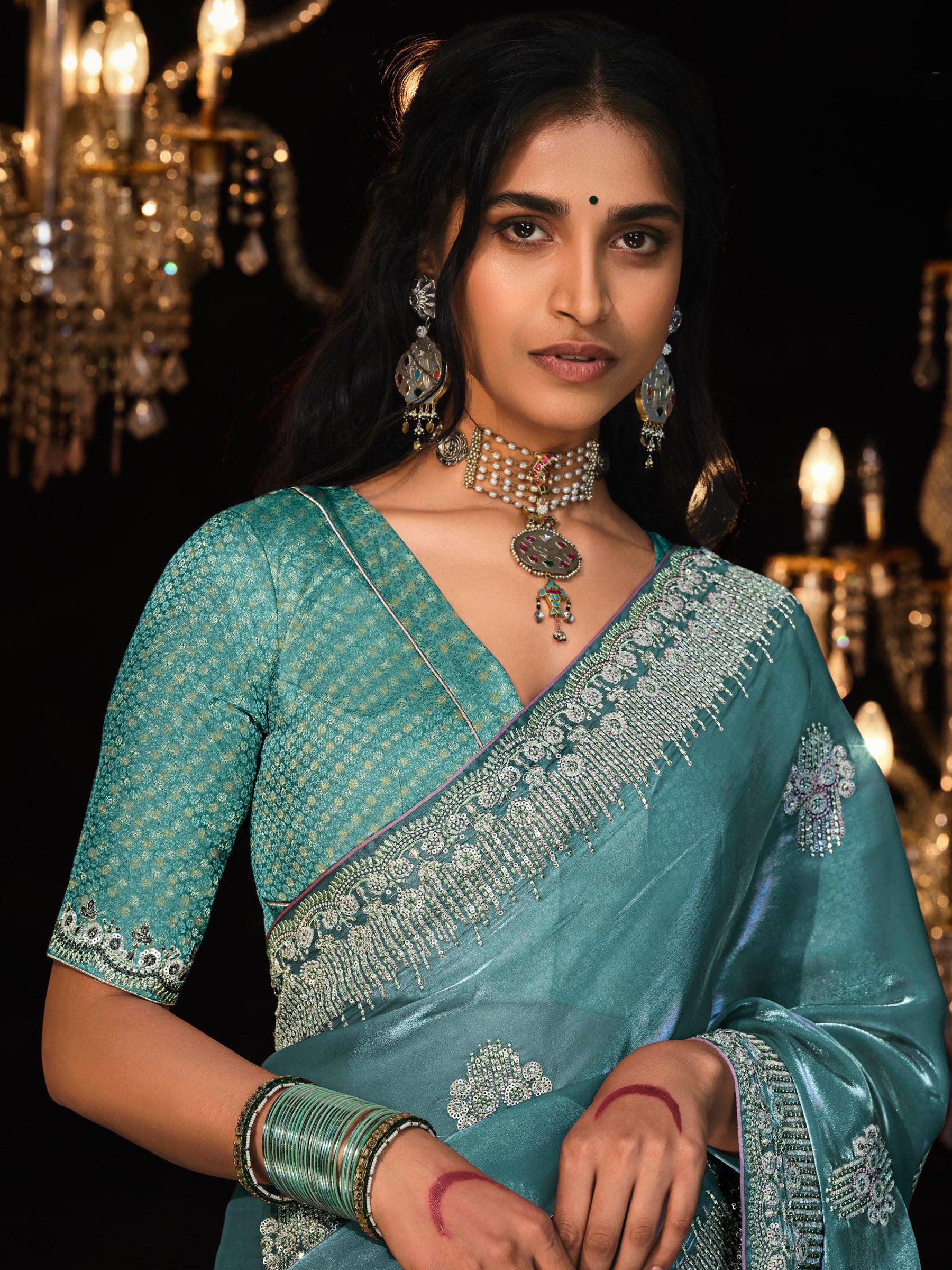 Fascinating Teal Blue Embroidered Tissue Silk Engagement Wear Saree