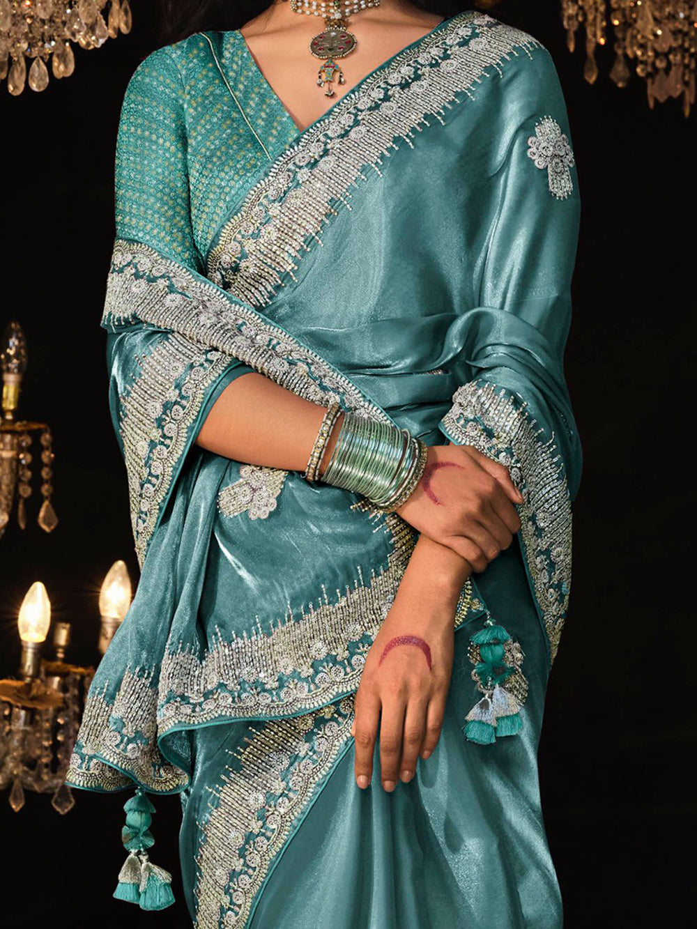 Fascinating Teal Blue Embroidered Tissue Silk Engagement Wear Saree