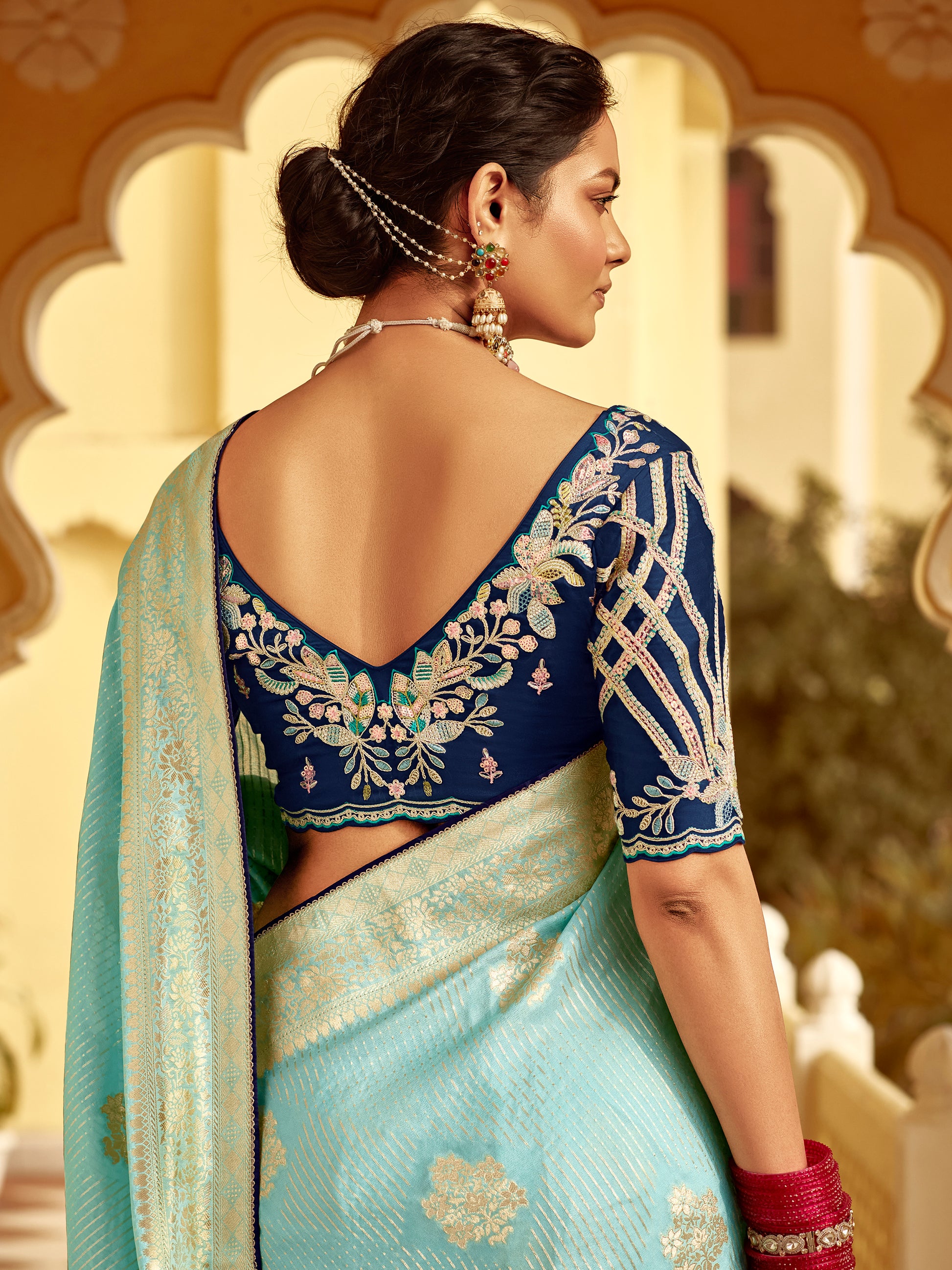 Majestic Sky Blue Zari Weaving Dola Silk Festive Wear Saree With Blouse