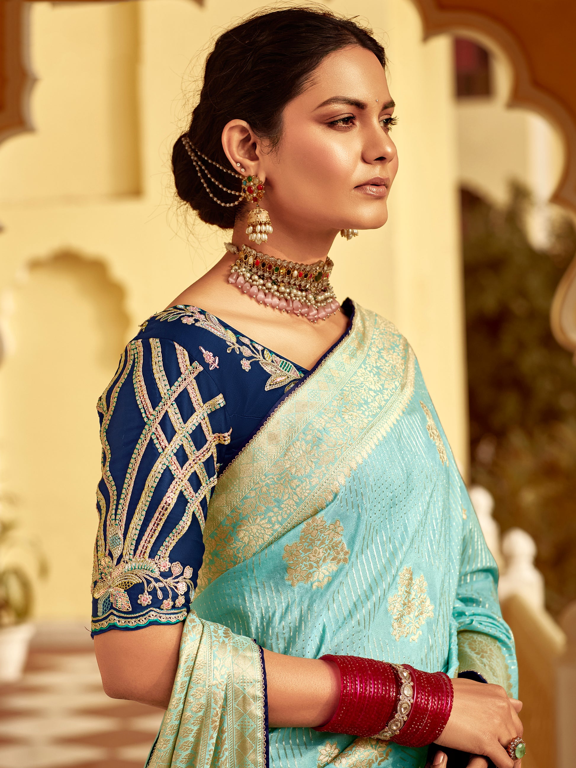 Majestic Sky Blue Zari Weaving Dola Silk Festive Wear Saree With Blouse