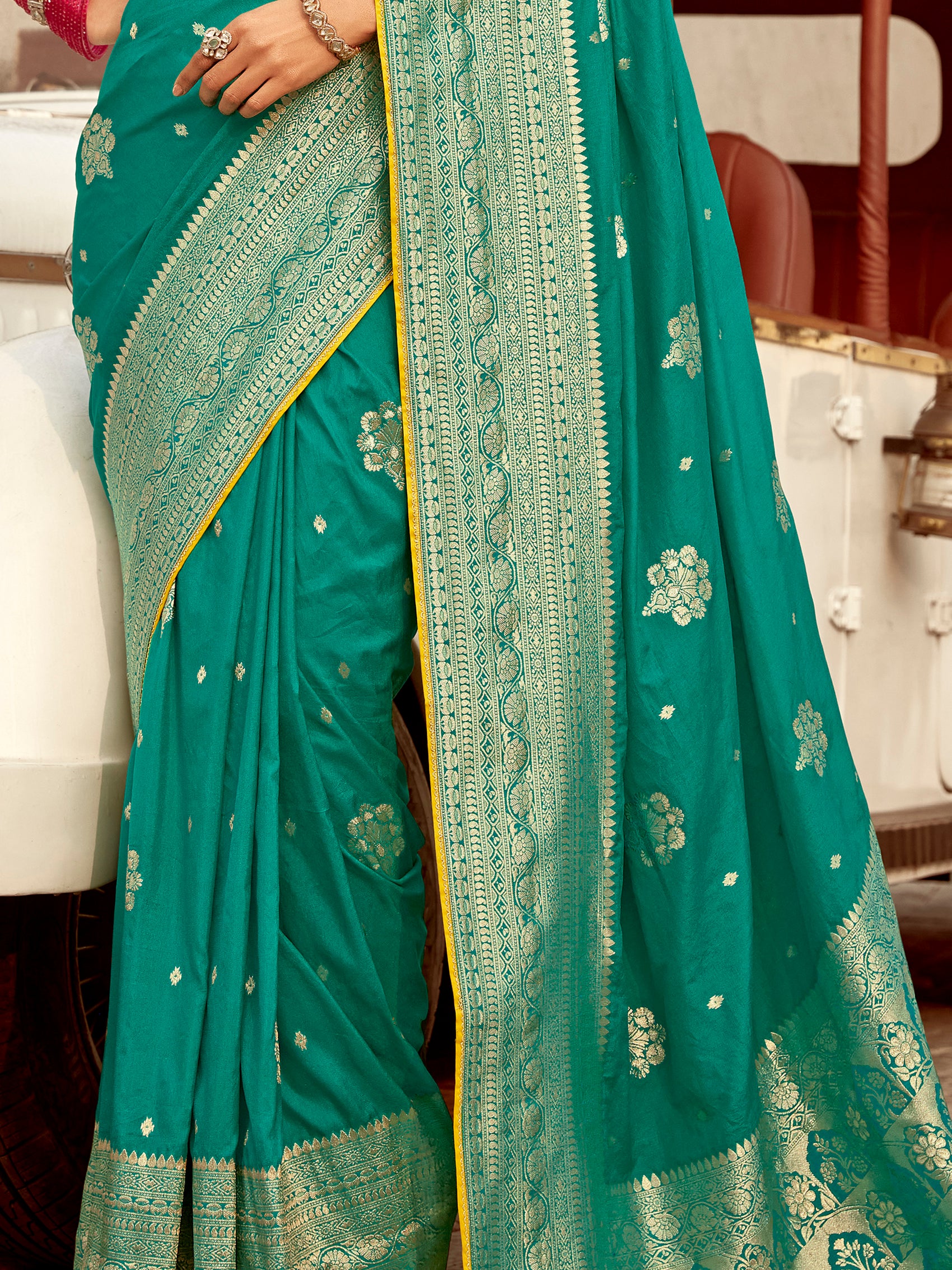 Attractive Teal Green Zari Weaving Dola Silk Engagement Wear Saree With Blouse