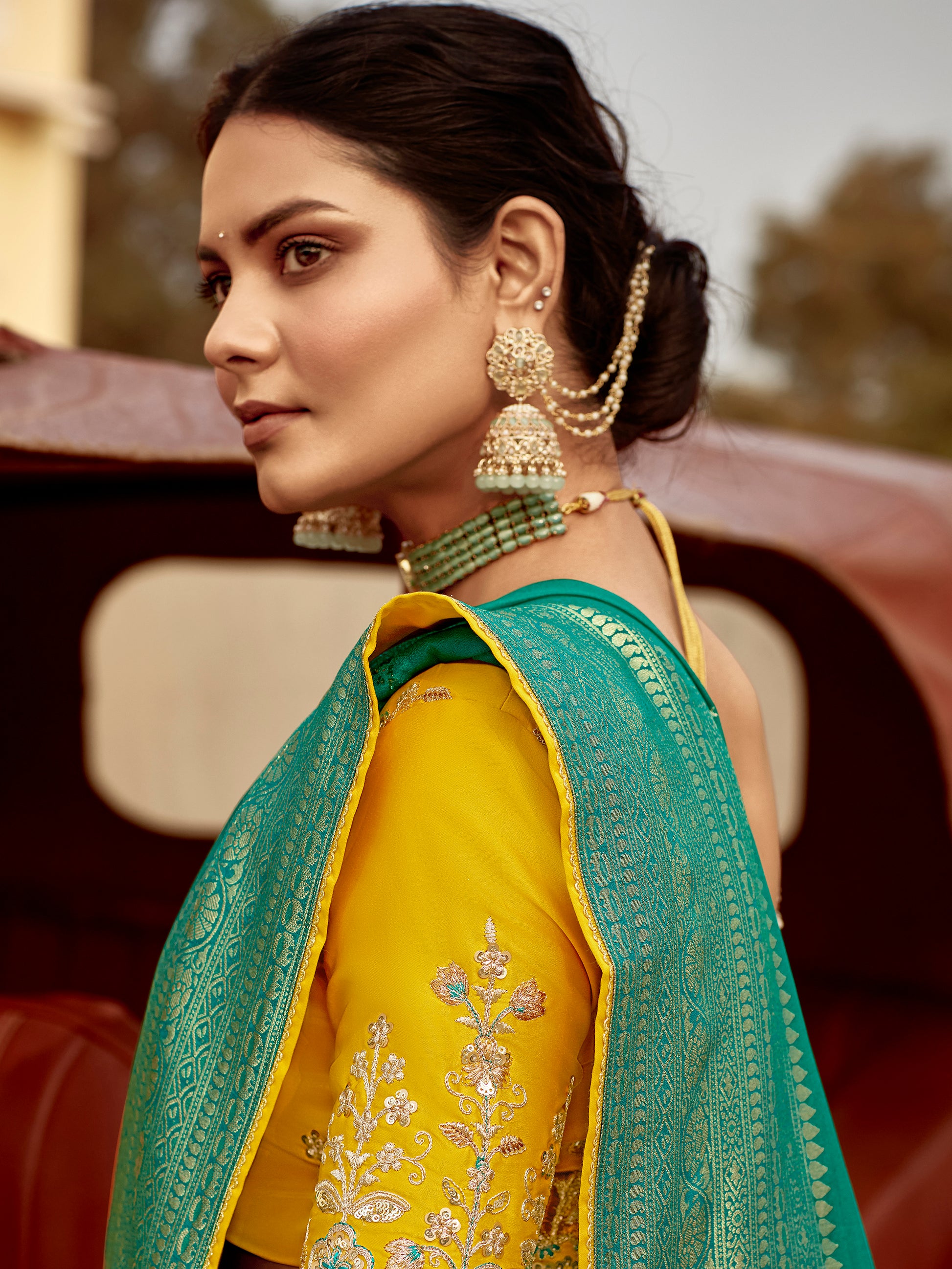 Attractive Teal Green Zari Weaving Dola Silk Engagement Wear Saree With Blouse
