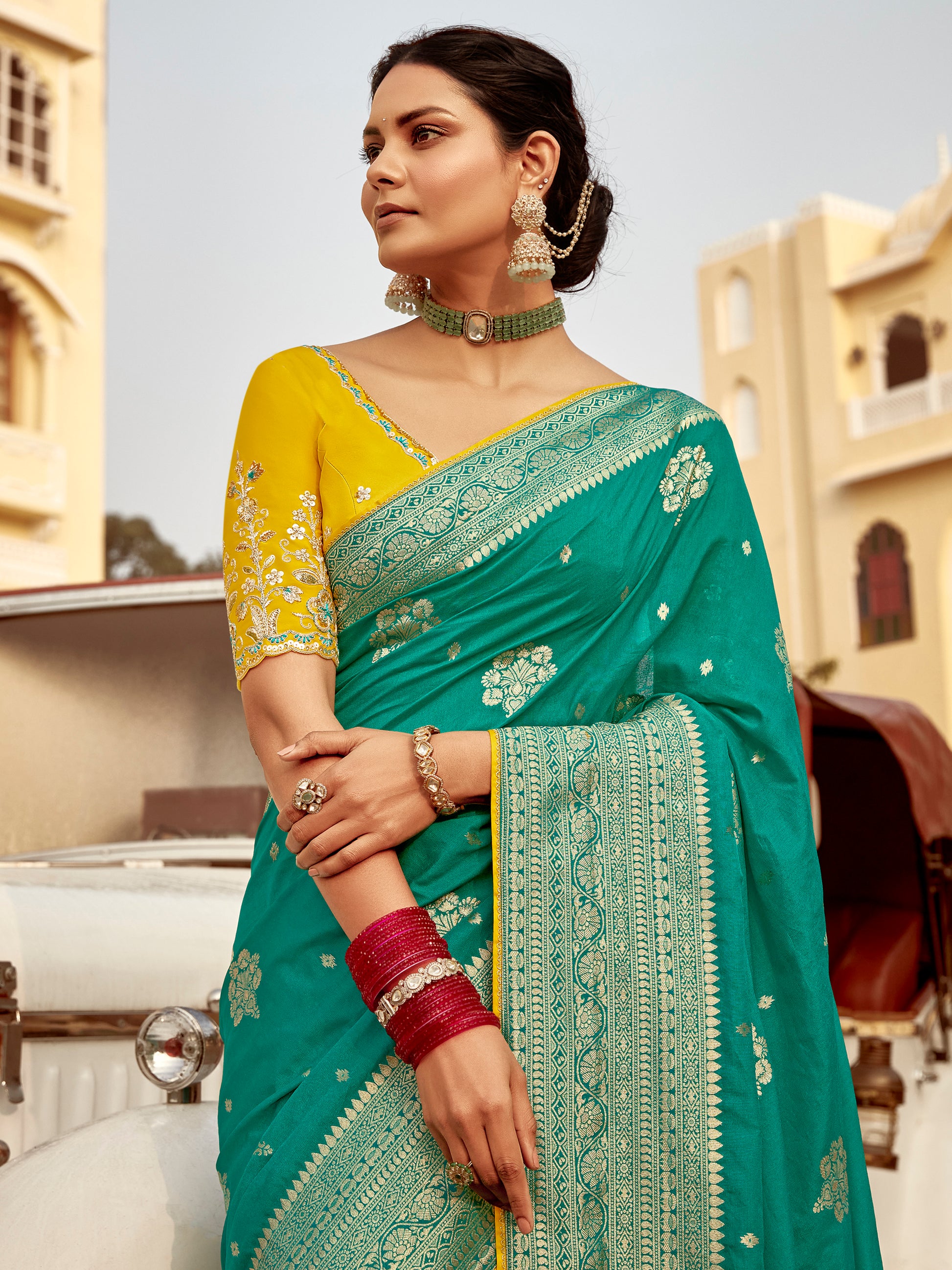Attractive Teal Green Zari Weaving Dola Silk Engagement Wear Saree With Blouse