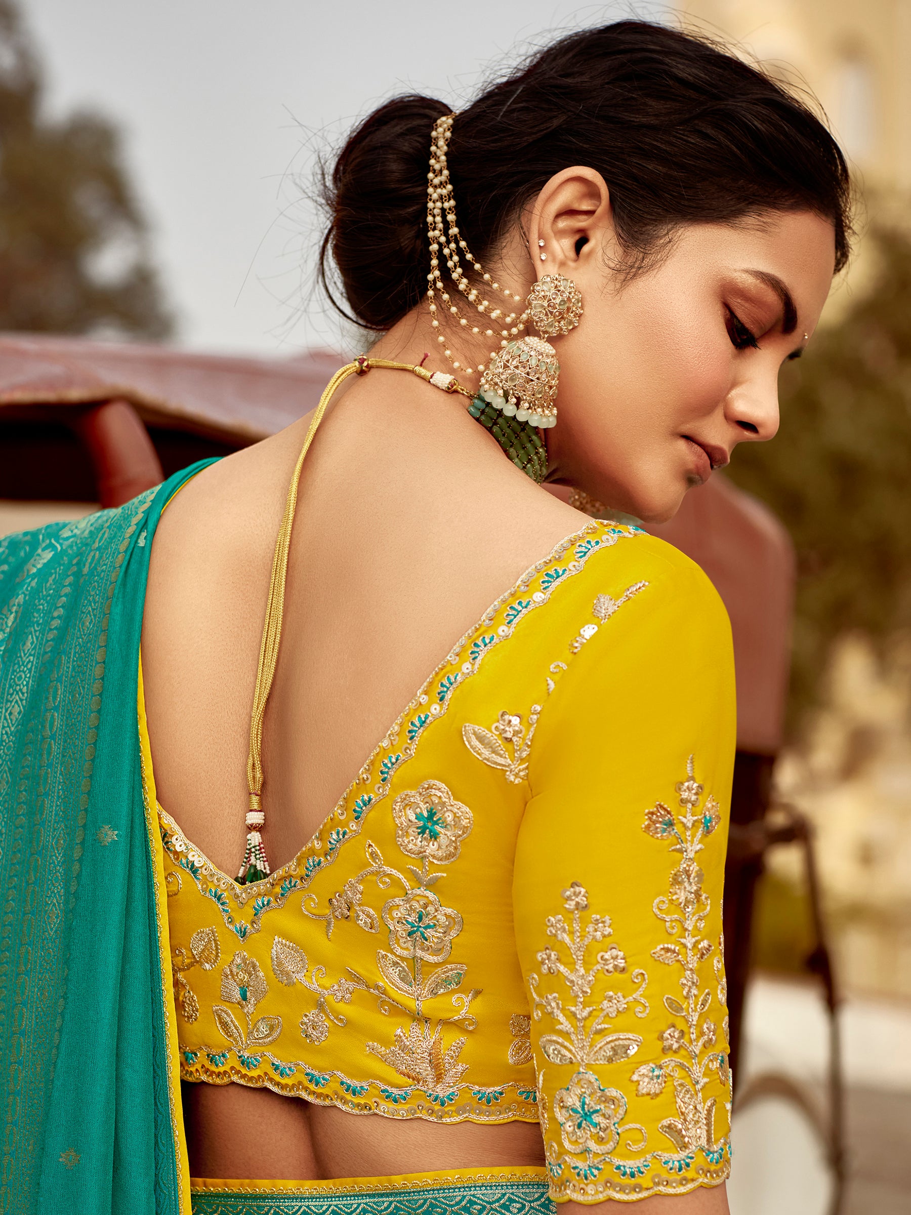 Attractive Teal Green Zari Weaving Dola Silk Engagement Wear Saree With Blouse