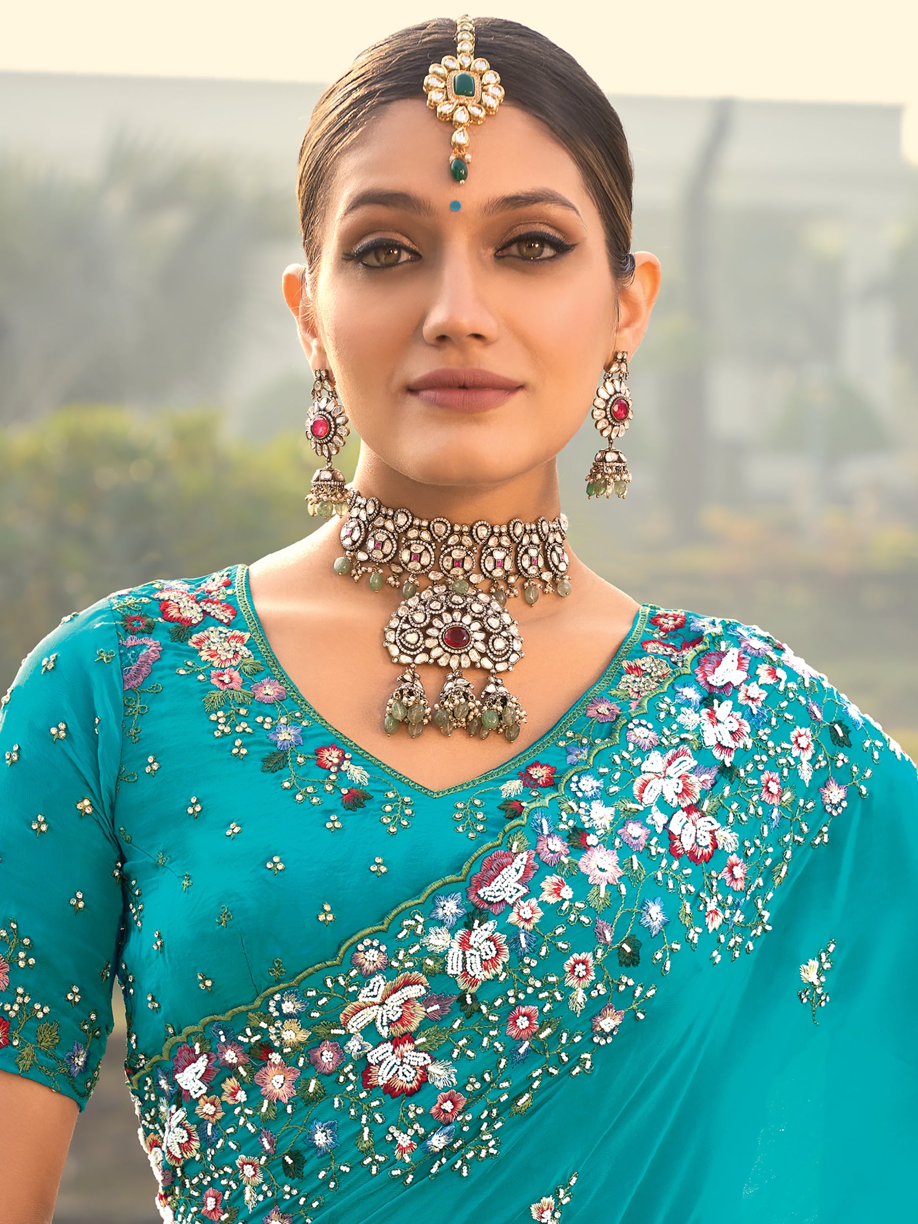 Fascinating Sky Blue Heavy Border Work Crape Silk Traditional Saree