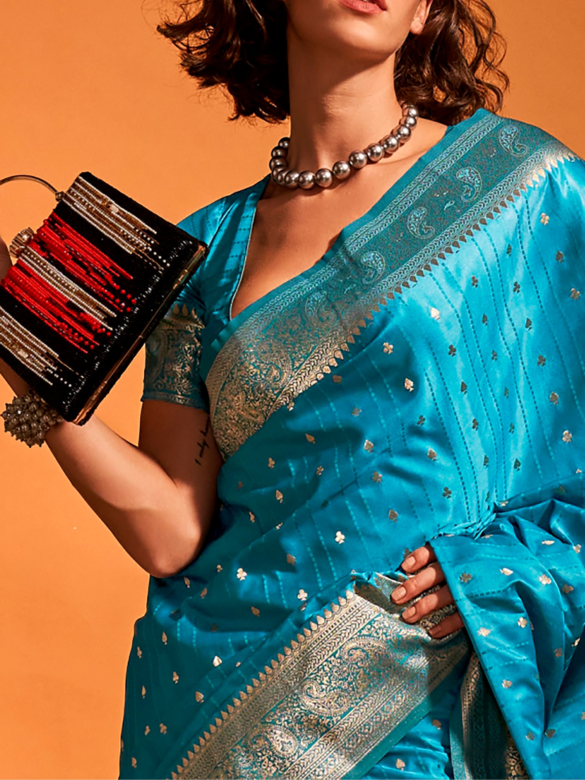 Charming Blue Zari Weaving Satin Reception Wear Saree With Blouse