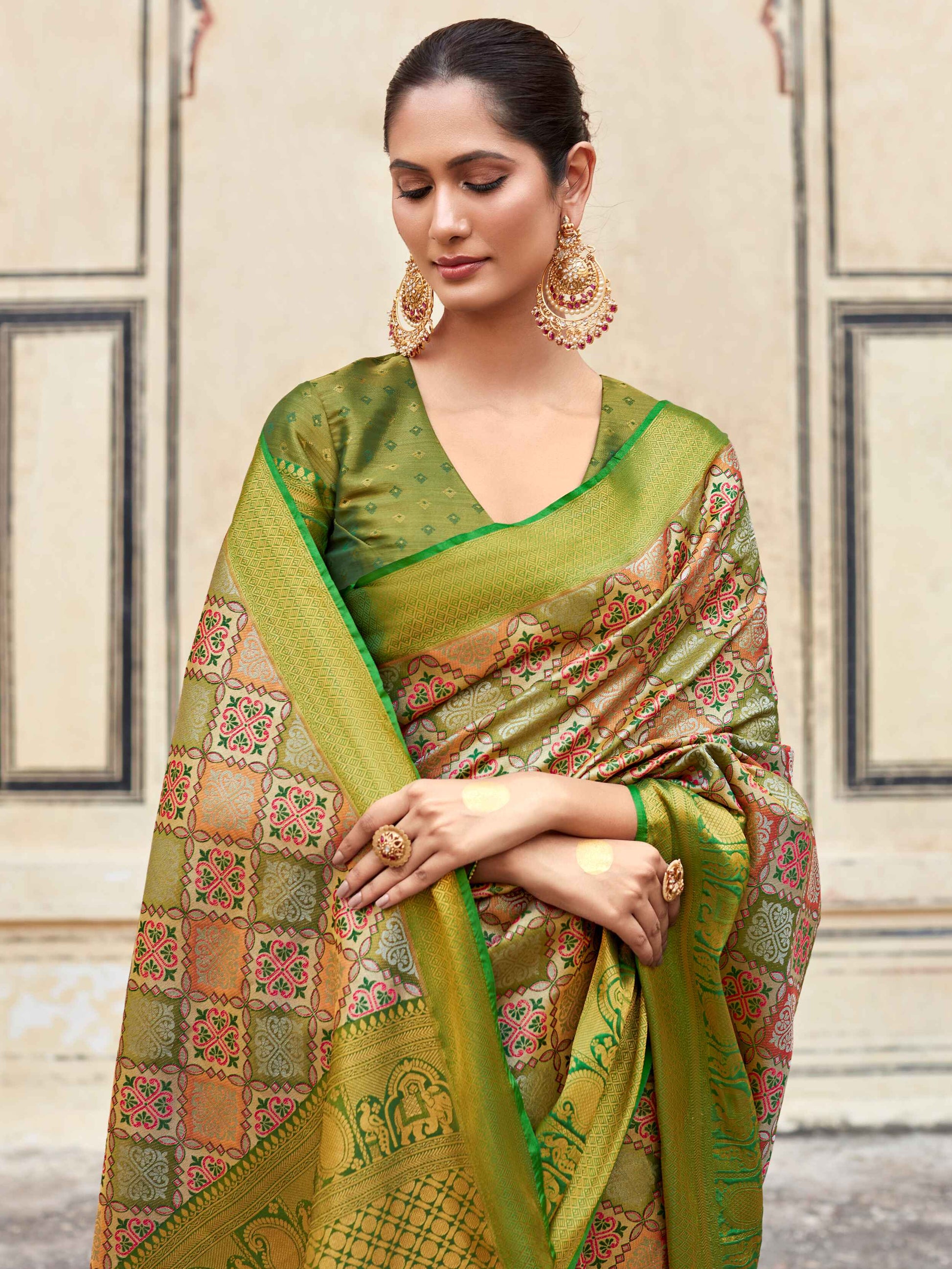 Engaging Green Zari Weaving Silk Mehendi Wear Saree With Blouse