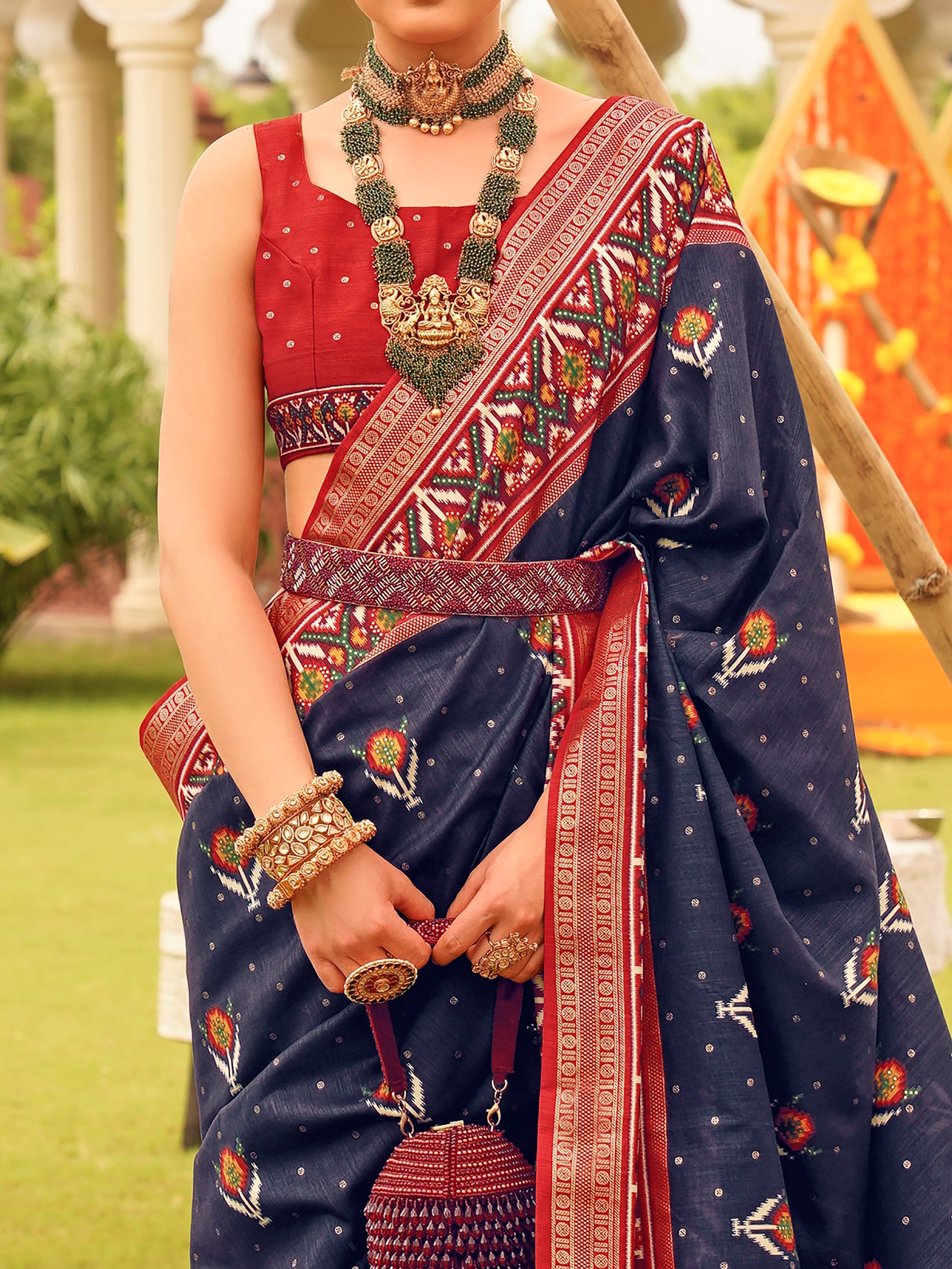 Spectacular Navy-Blue Patola Printed Silk Wedding Wear Saree