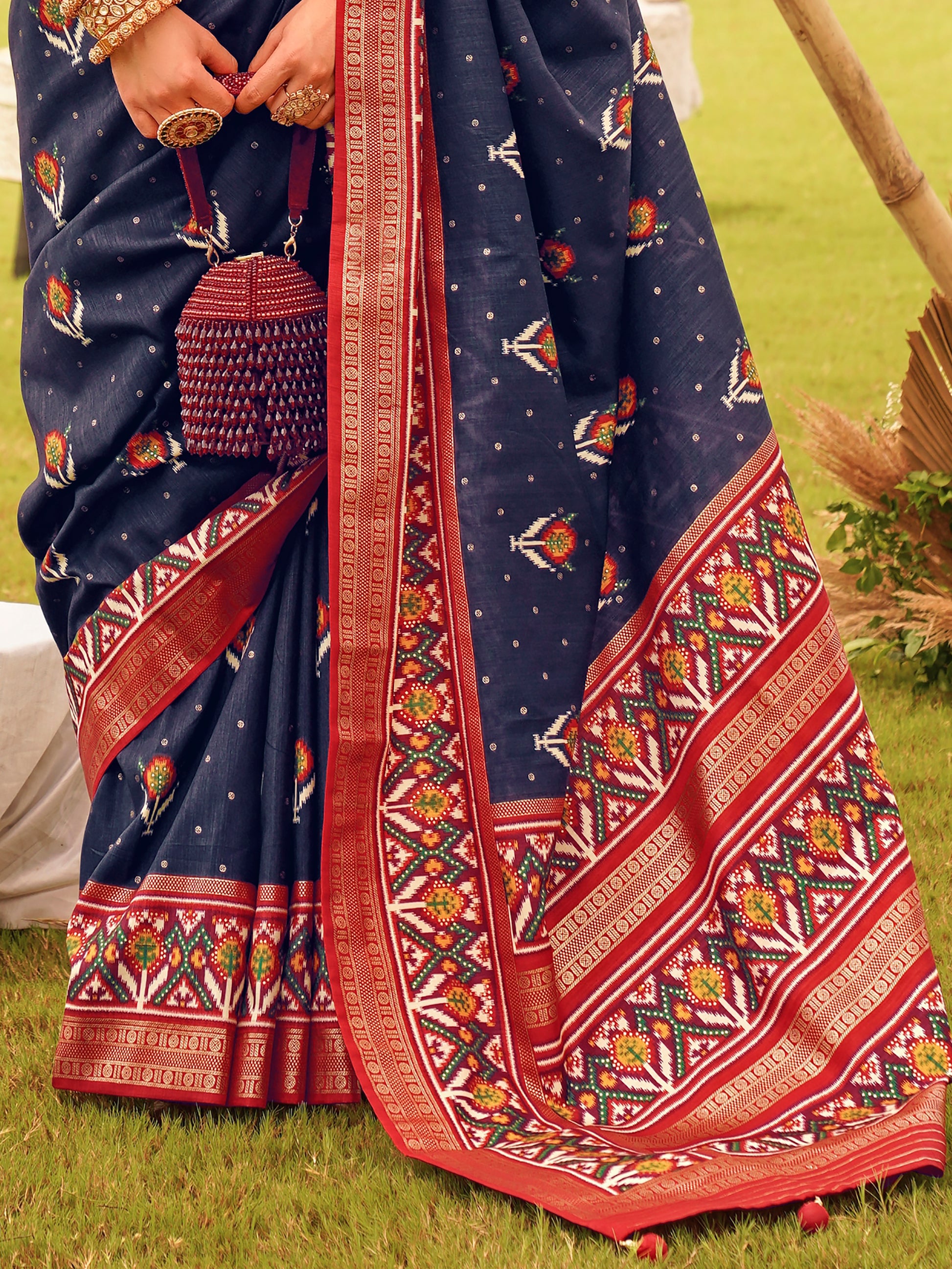 Spectacular Navy-Blue Patola Printed Silk Wedding Wear Saree
