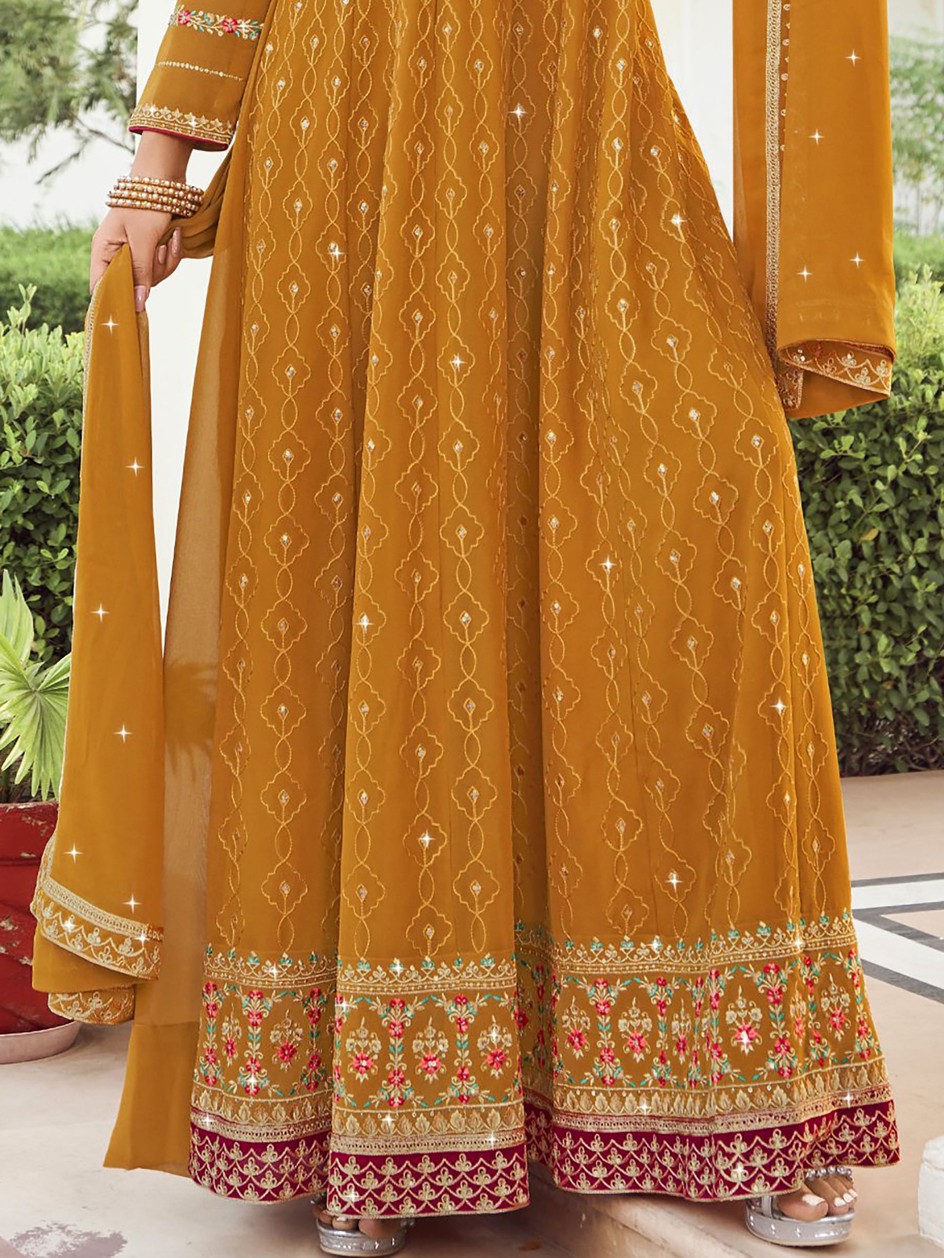 Stunning Yellow Embroidered Georgette Gown