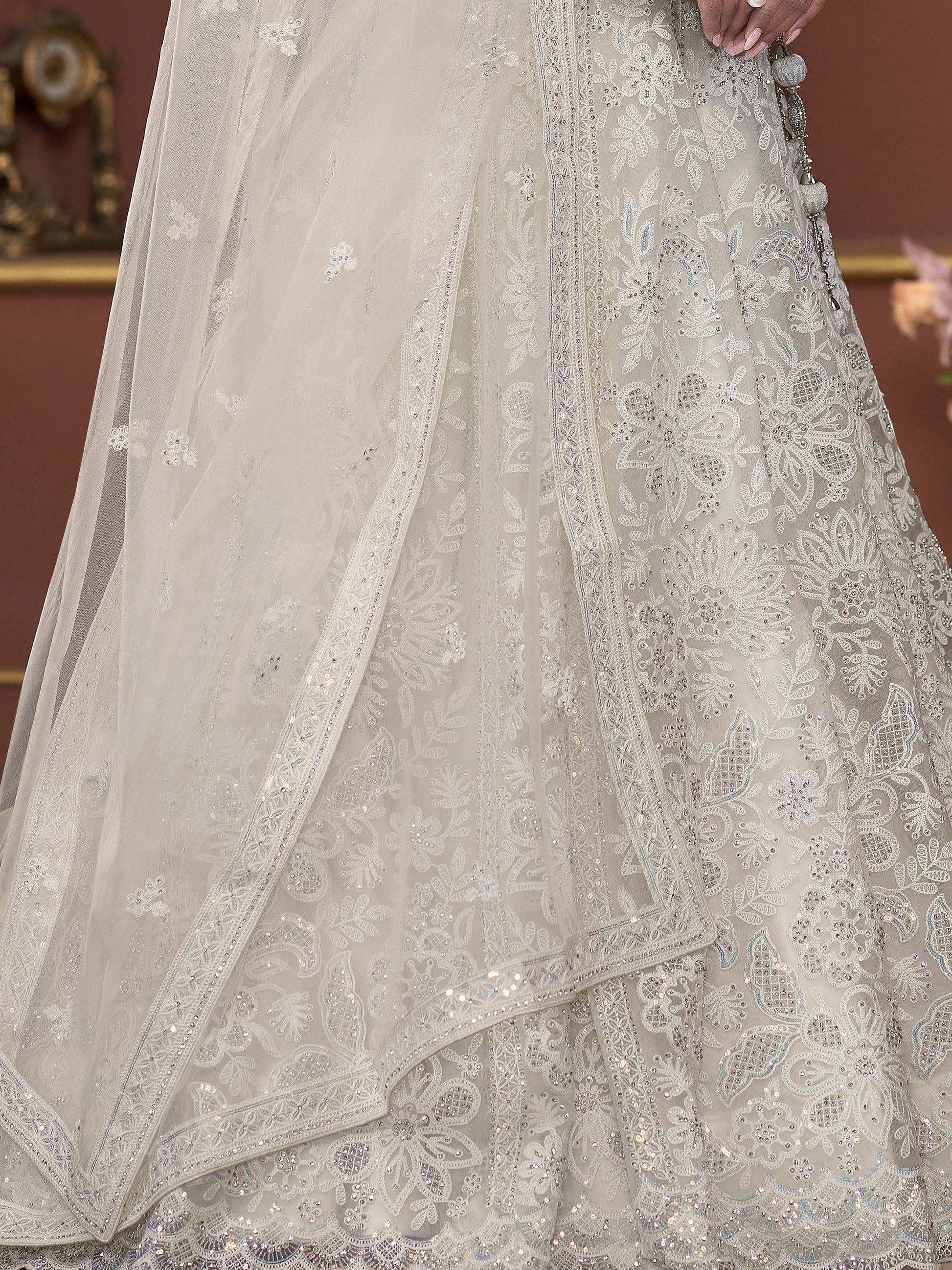 Adorable Off-White Sequins Net Engagement Wear Lehenga Choli