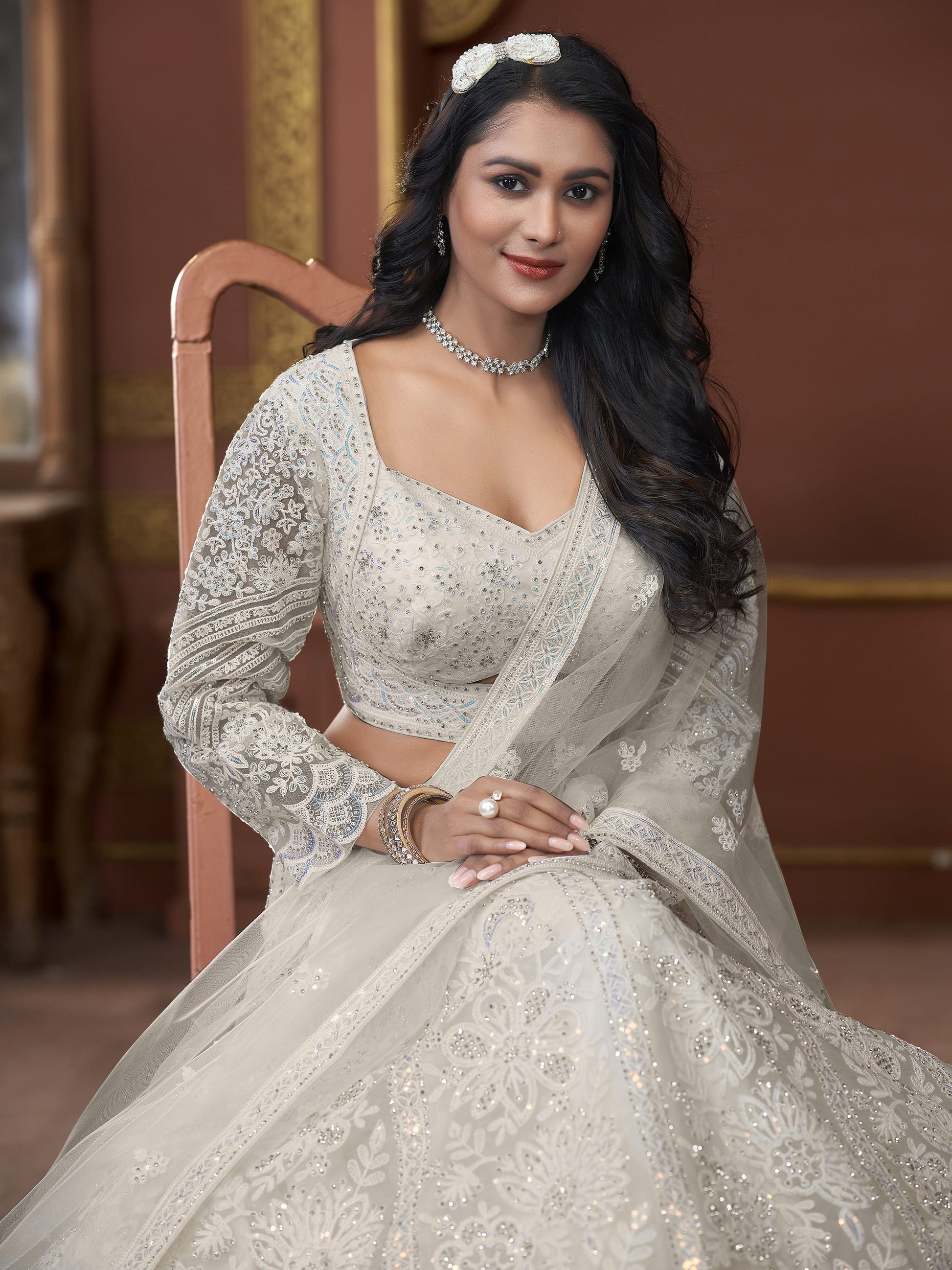 Adorable Off-White Sequins Net Engagement Wear Lehenga Choli