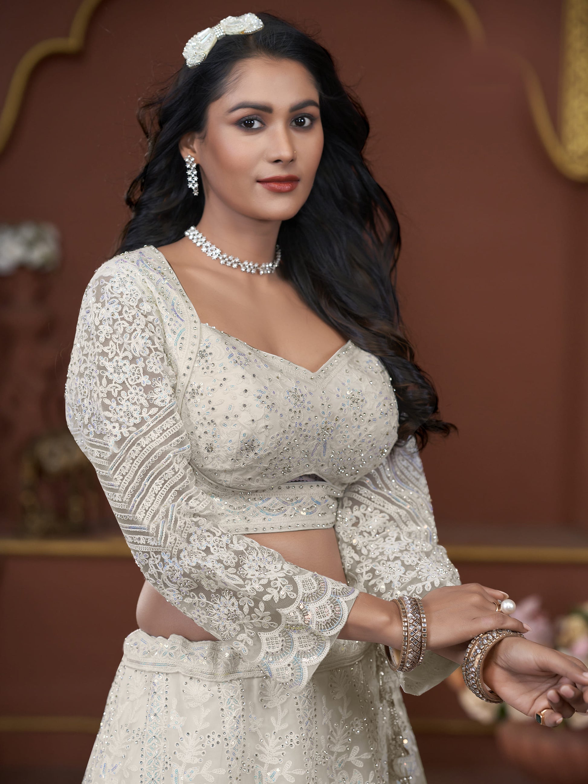 Adorable Off-White Sequins Net Engagement Wear Lehenga Choli