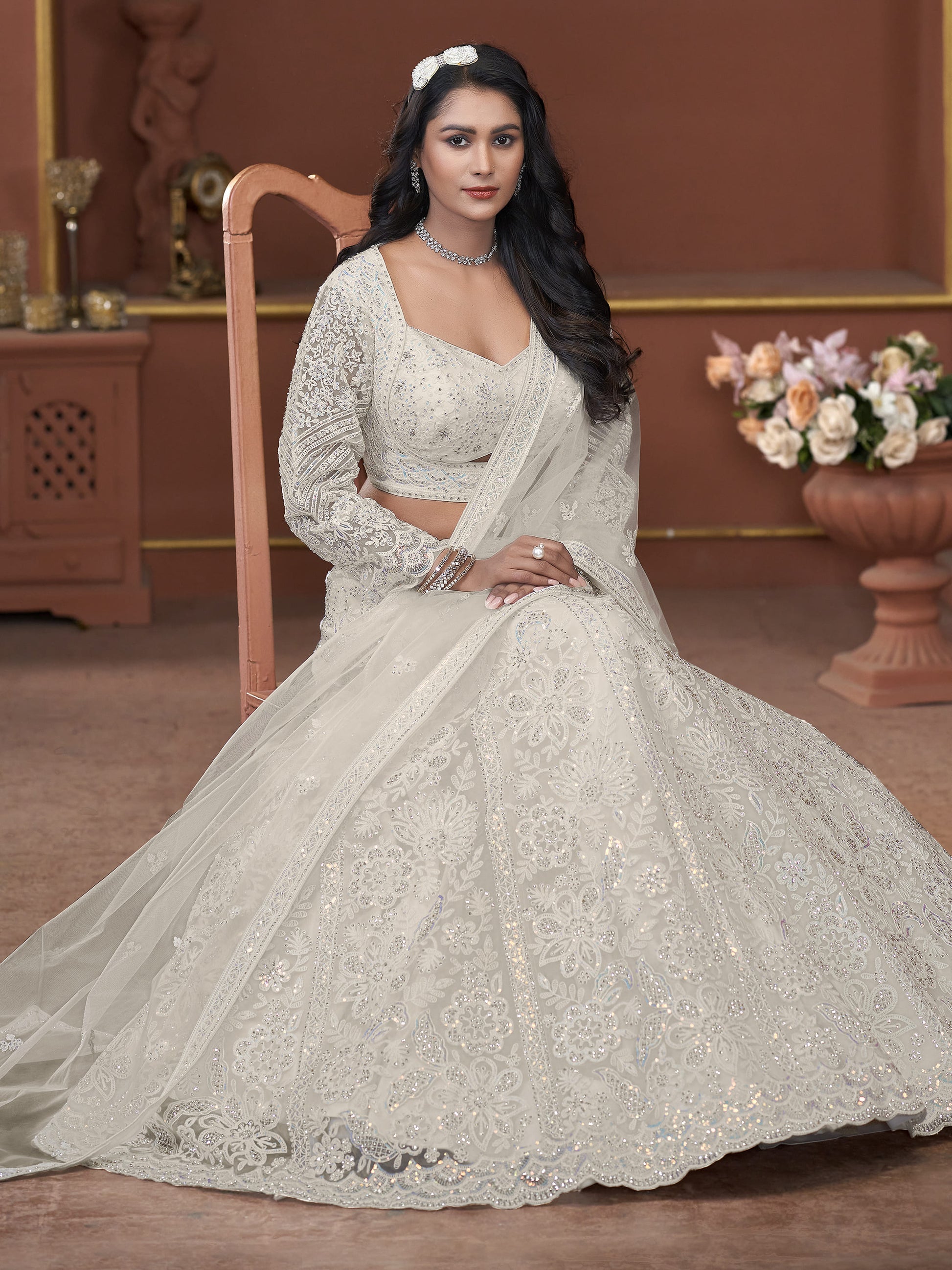 Adorable Off-White Sequins Net Engagement Wear Lehenga Choli