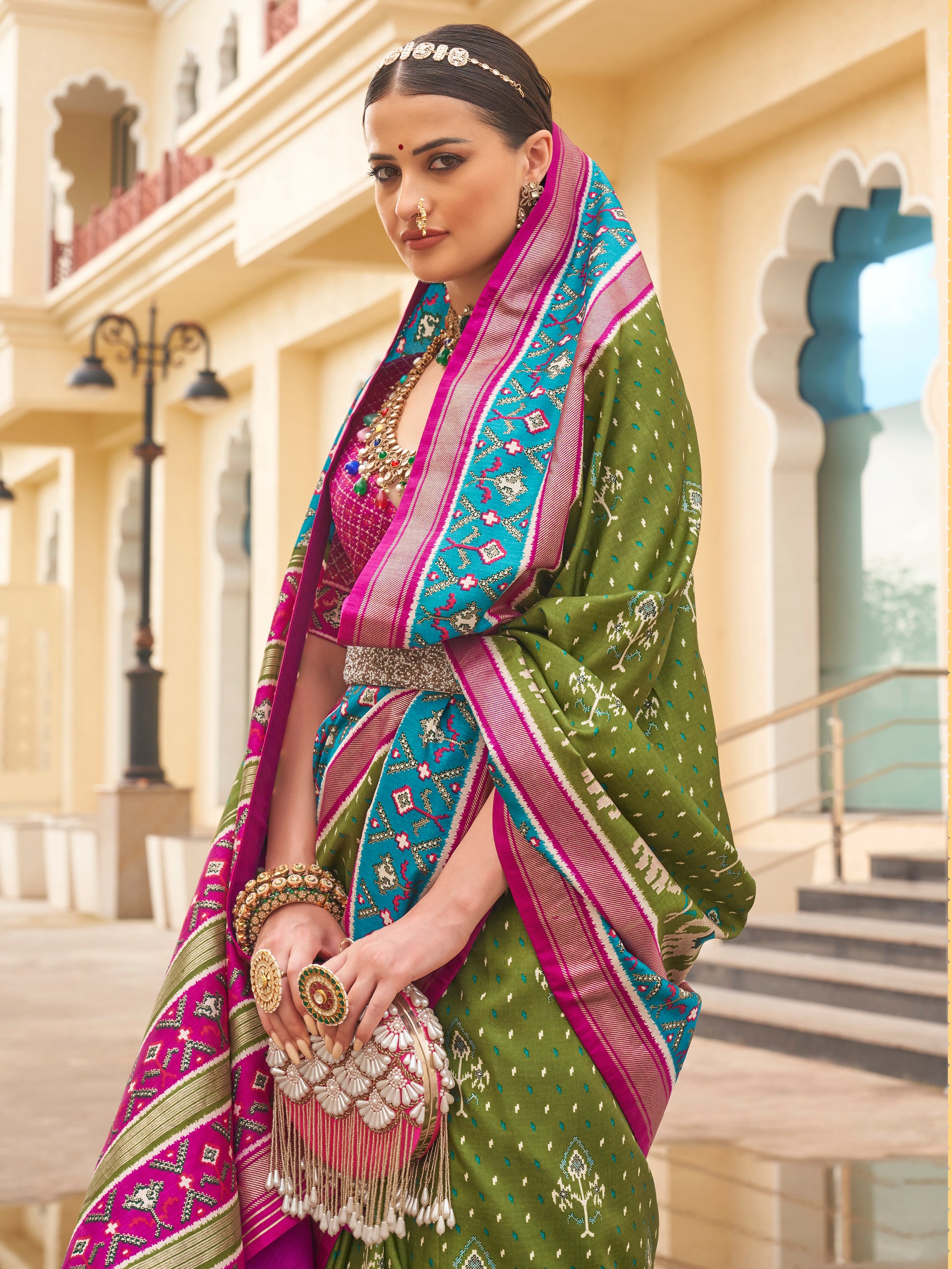 Enchanting Green Patola Print Silk Mehendi Wear Saree With Blouse