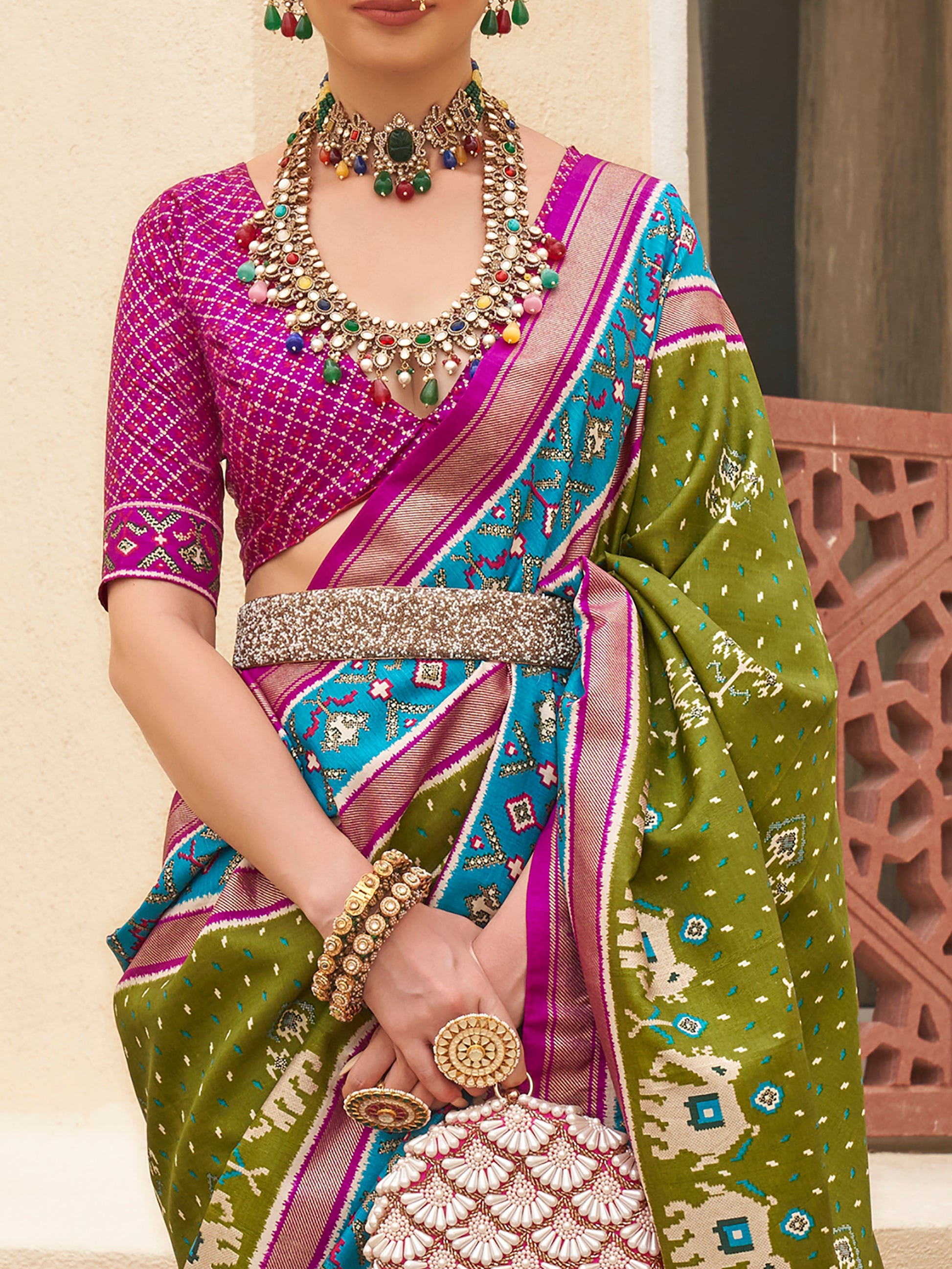 Enchanting Green Patola Print Silk Mehendi Wear Saree With Blouse