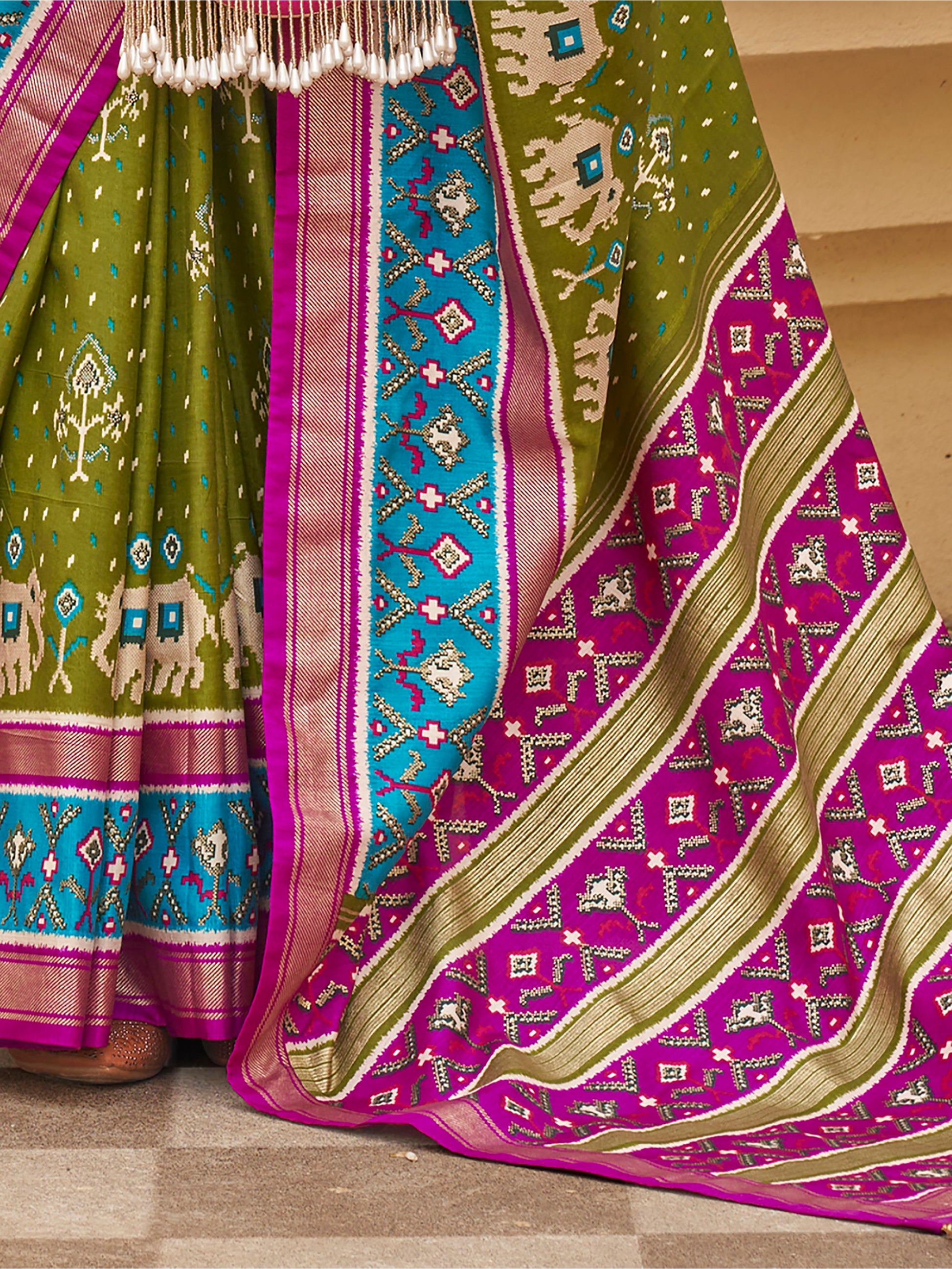 Enchanting Green Patola Print Silk Mehendi Wear Saree With Blouse