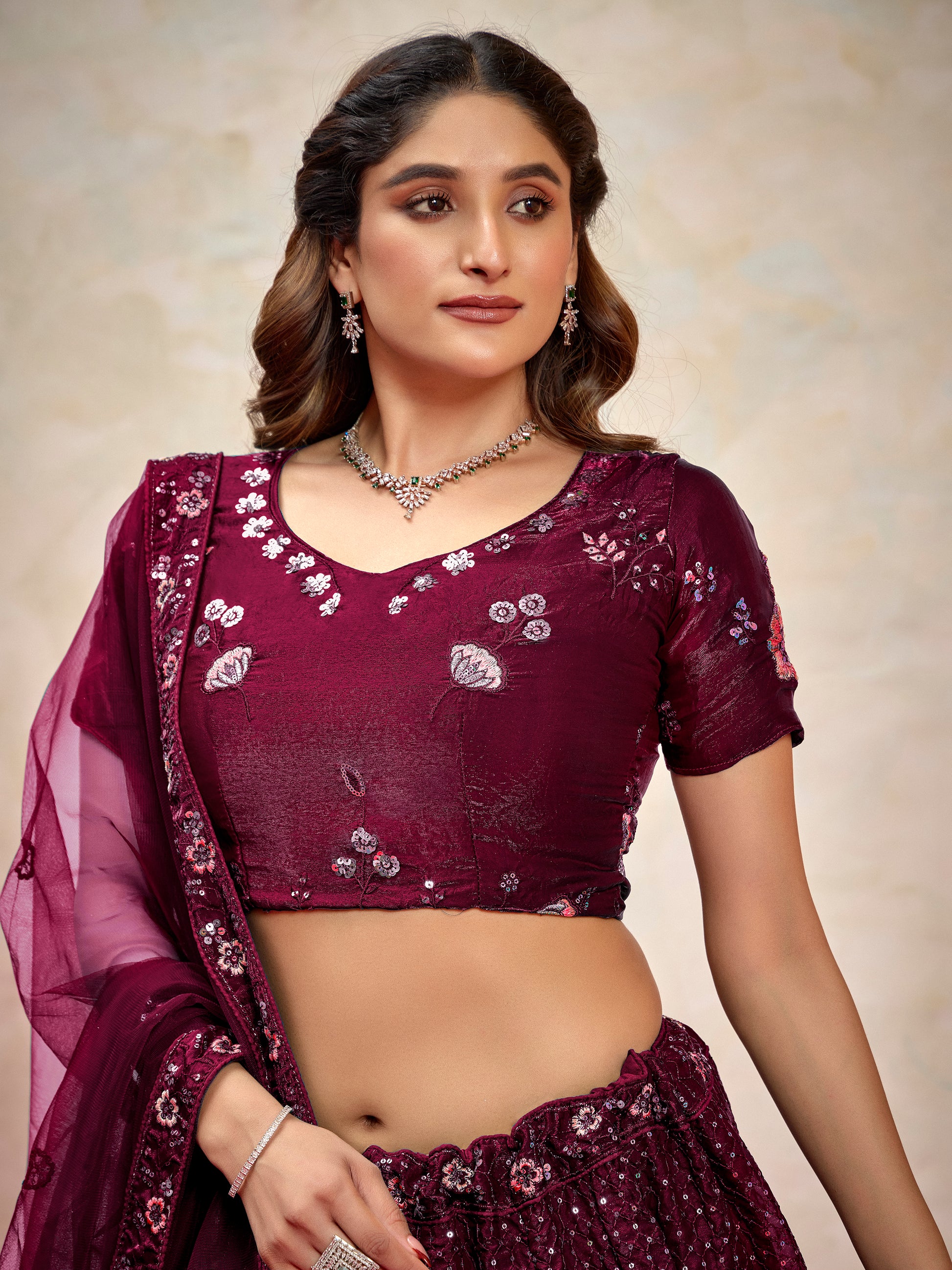 Ravishing Wine Thread Embroidered Net Reception Wear Lehenga Choli With Dupatta