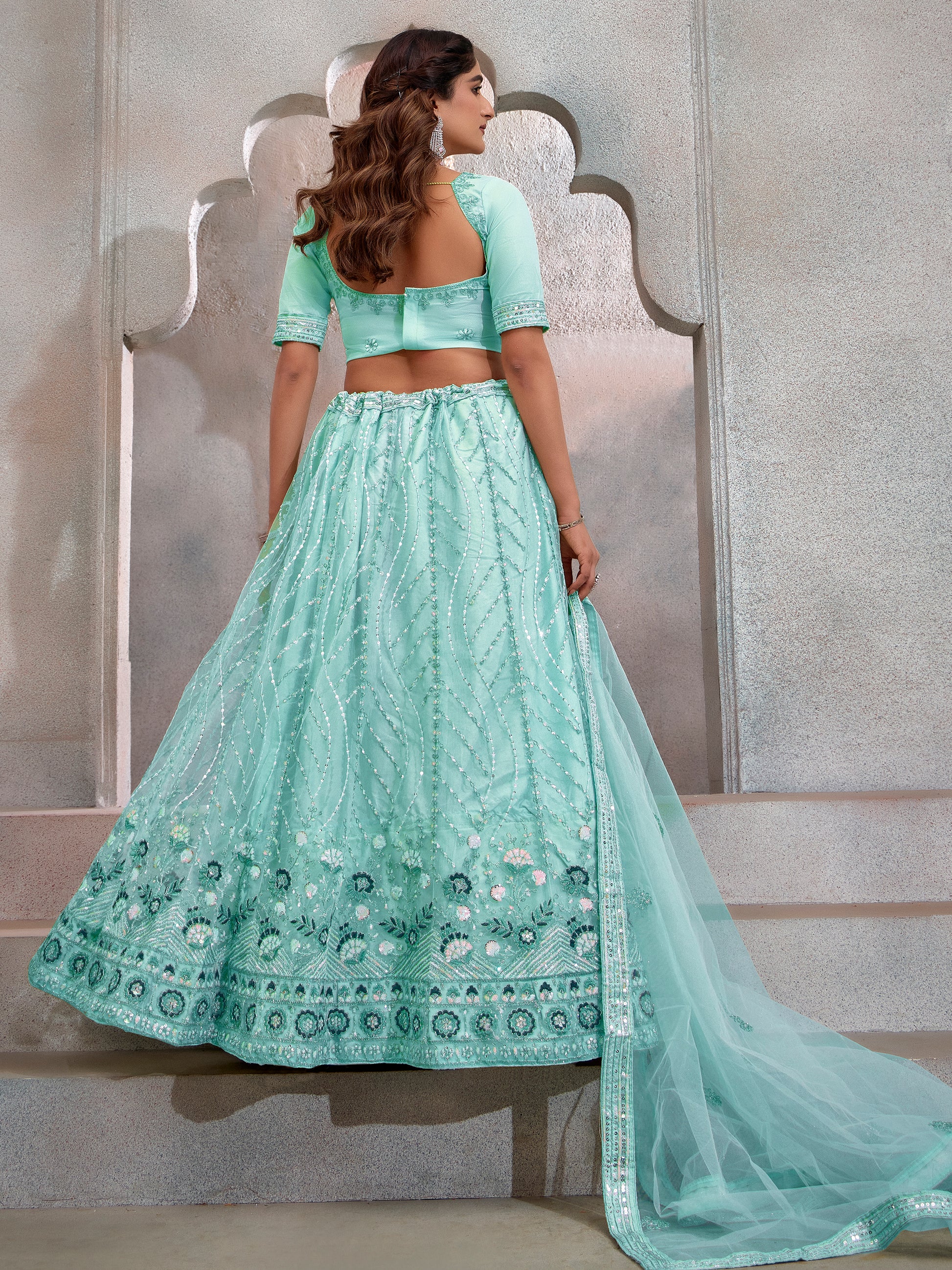 Beautiful Turquoise Sequins Net Designer Lehenga Choli With Dupatta